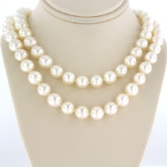 14k gold lock with single cut diamonds up to 0.86ct with two row pearl necklace