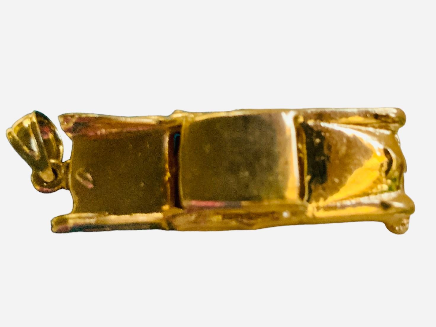 14k gold cadillac pendant