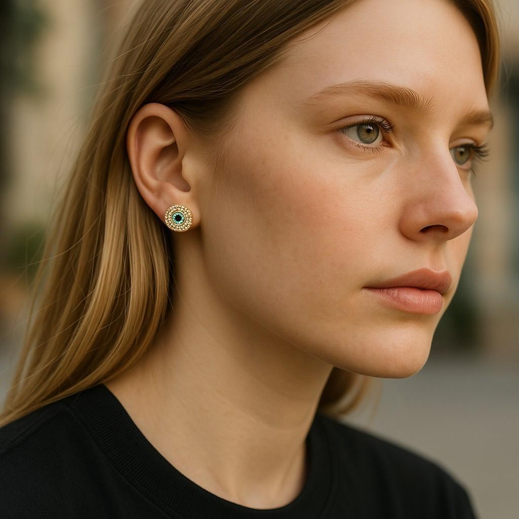Bring vibrant sophistication to your jewelry collection with these exquisite 14K Yellow Gold Emerald and Diamond Millgrain Stud Earrings. Expertly handcrafted in the heart of New York City’s diamond district, these earrings are a celebration of fine
