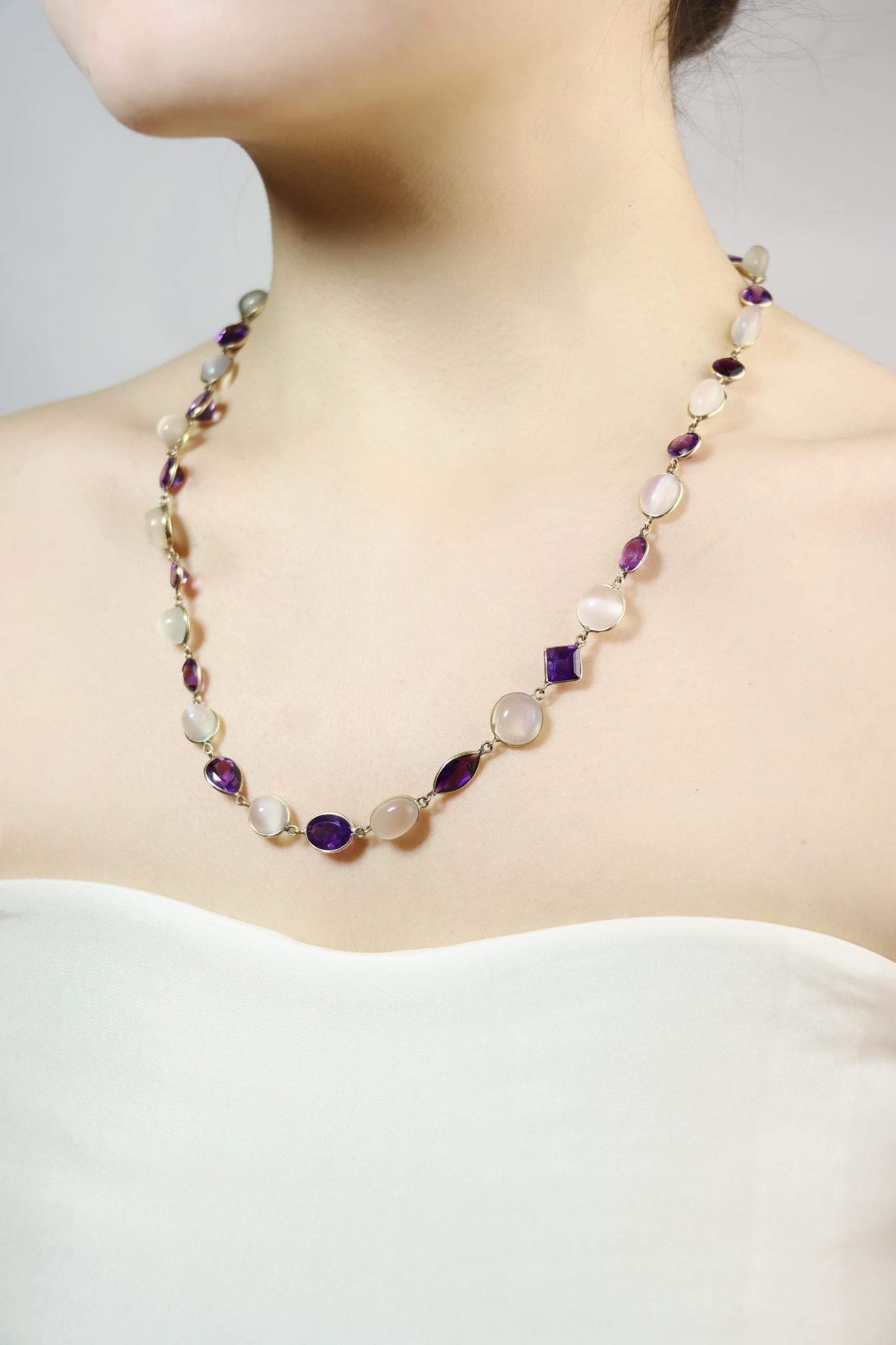 14K Gold Mix-Cut Amethyst Moonstone Necklace

Approximate Dimensions:
53.7 cm (Length) 
0.5 - 1 cm (Width)
25.9 grams in weight