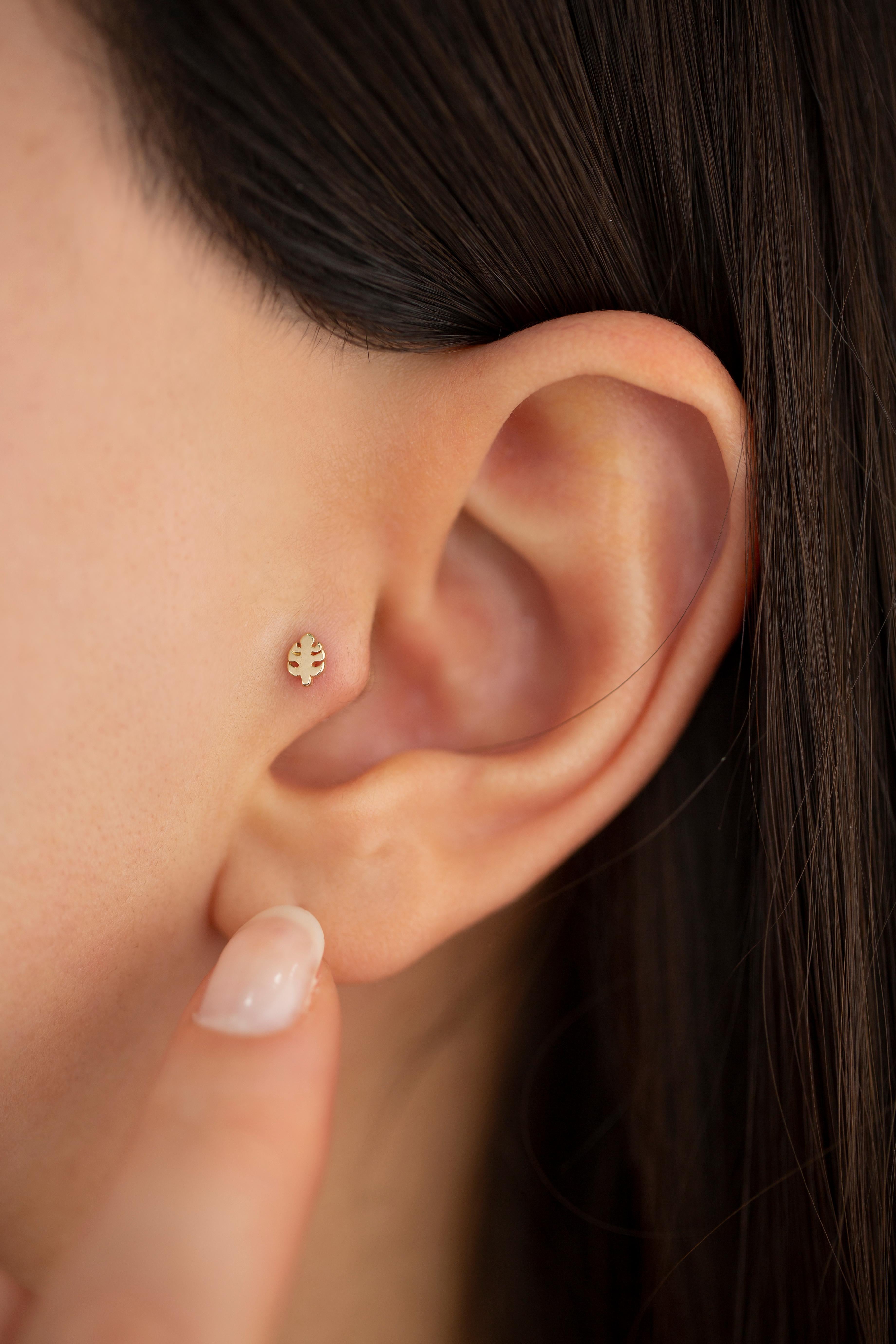 gold monstera earrings