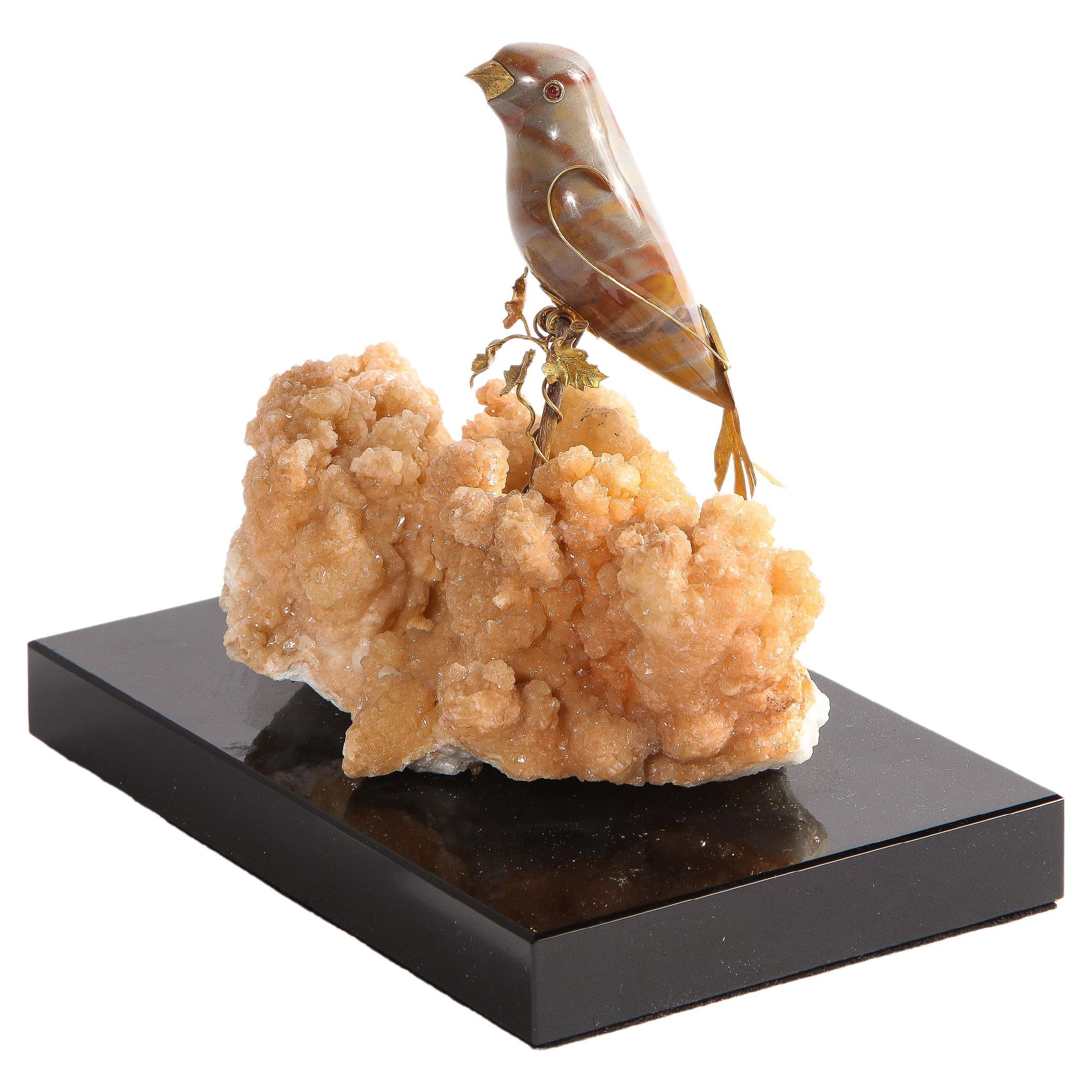 
A 14K gold mounted agate bird on Fluorite stone, Mounted on black glass, 20th century.

A really nice and cool object - a true collectors piece.

Measures: 6