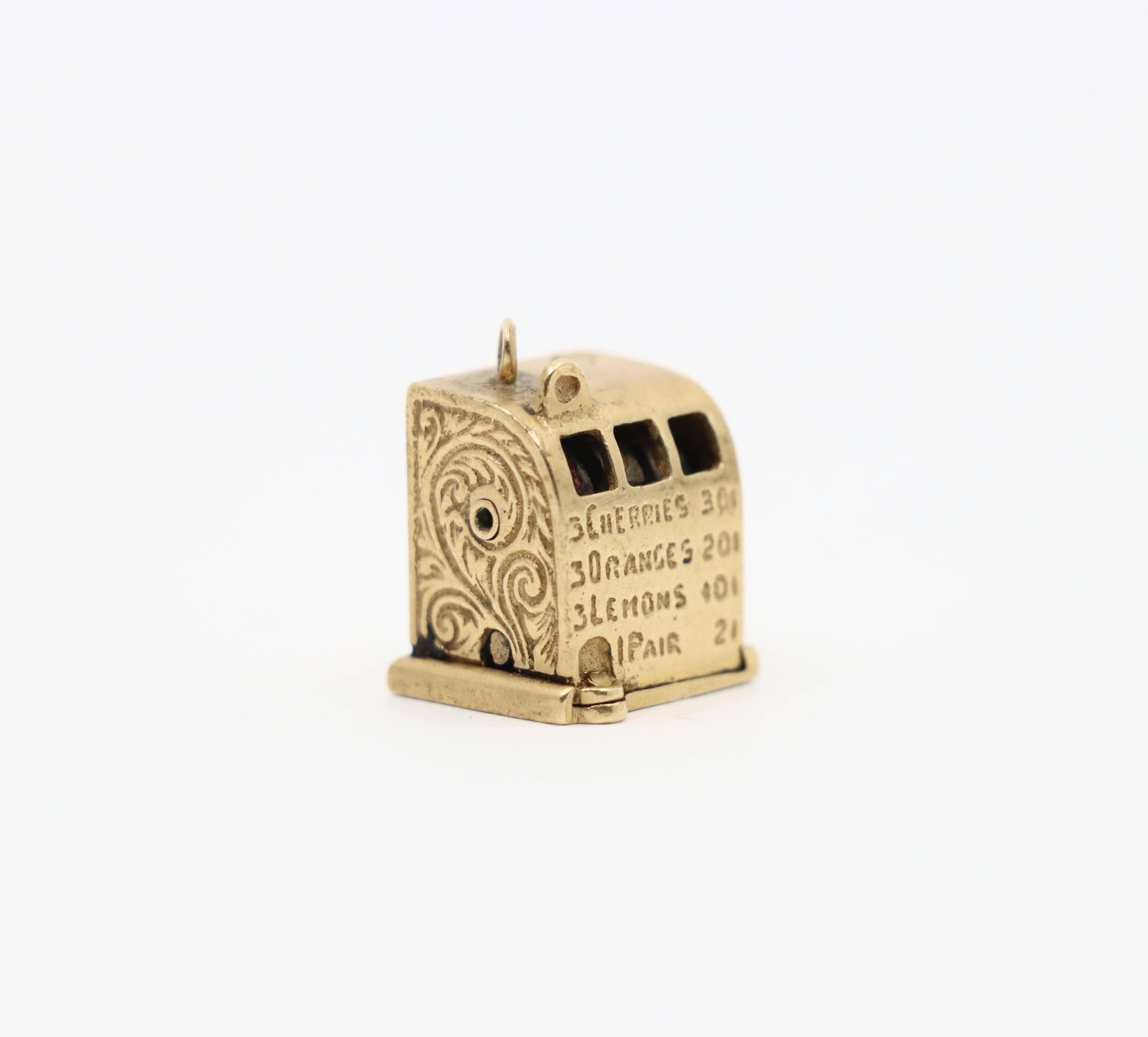 14K Gold Movable Slot Machine Charm

Approximate Dimensions:
1.4 cm (Length)
1.2 cm (Width)
1.6 cm (Hight)
8.8 grams in weight.
