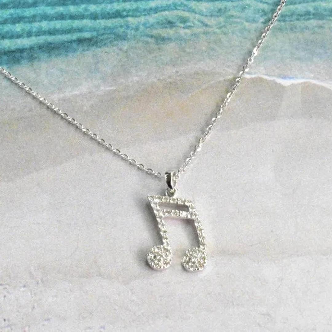 music note gold pendant