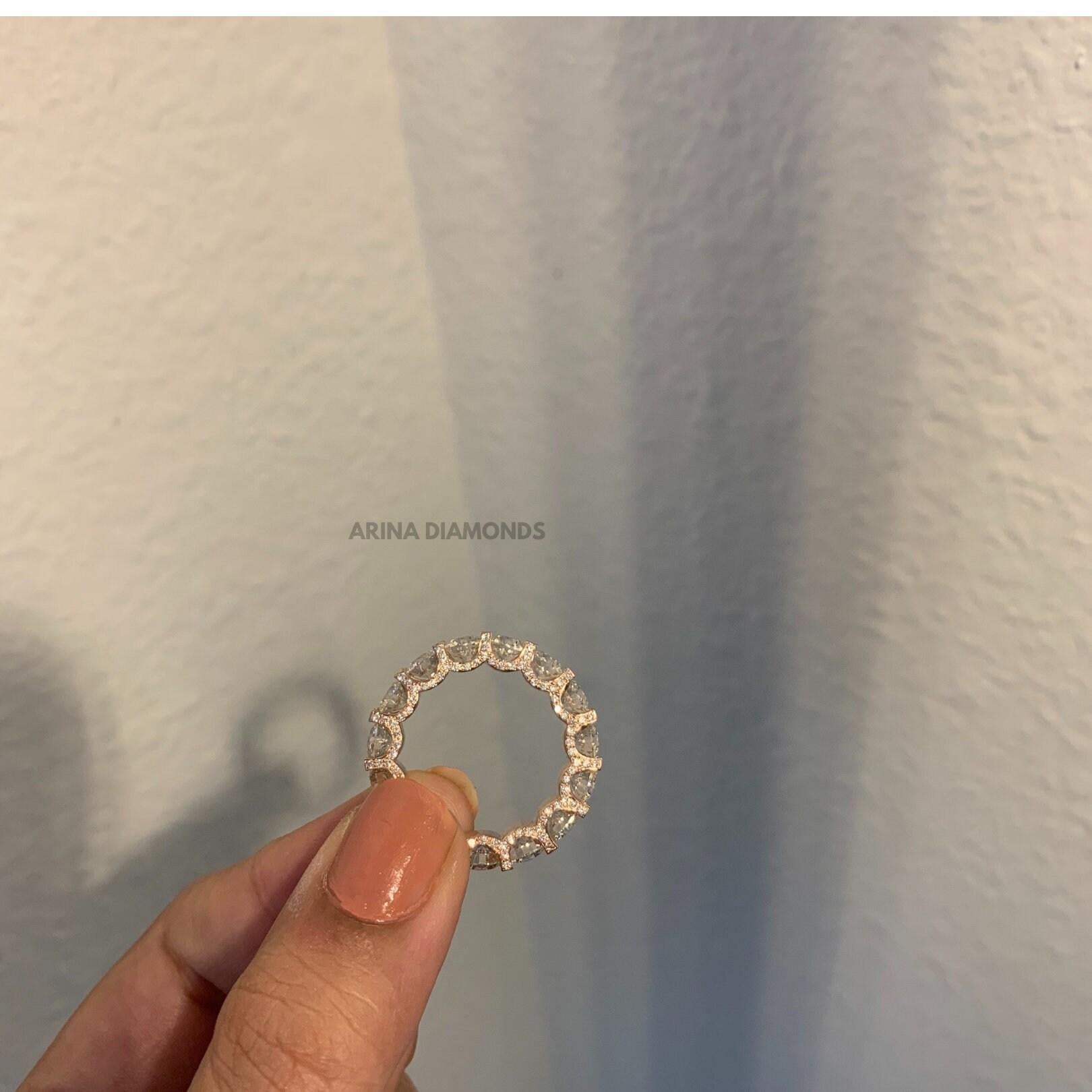 Main Stone Creation: Natural
Metal Purity:	14k
Country/Region of Manufacture: United States
Total Carat Weight: 7 Carats
Each stone is .35 pointers
Base Metal: 14k White Gold
Clarity: SI1-SI2
Diamond Color: G

PLEASE MENTION GOLD