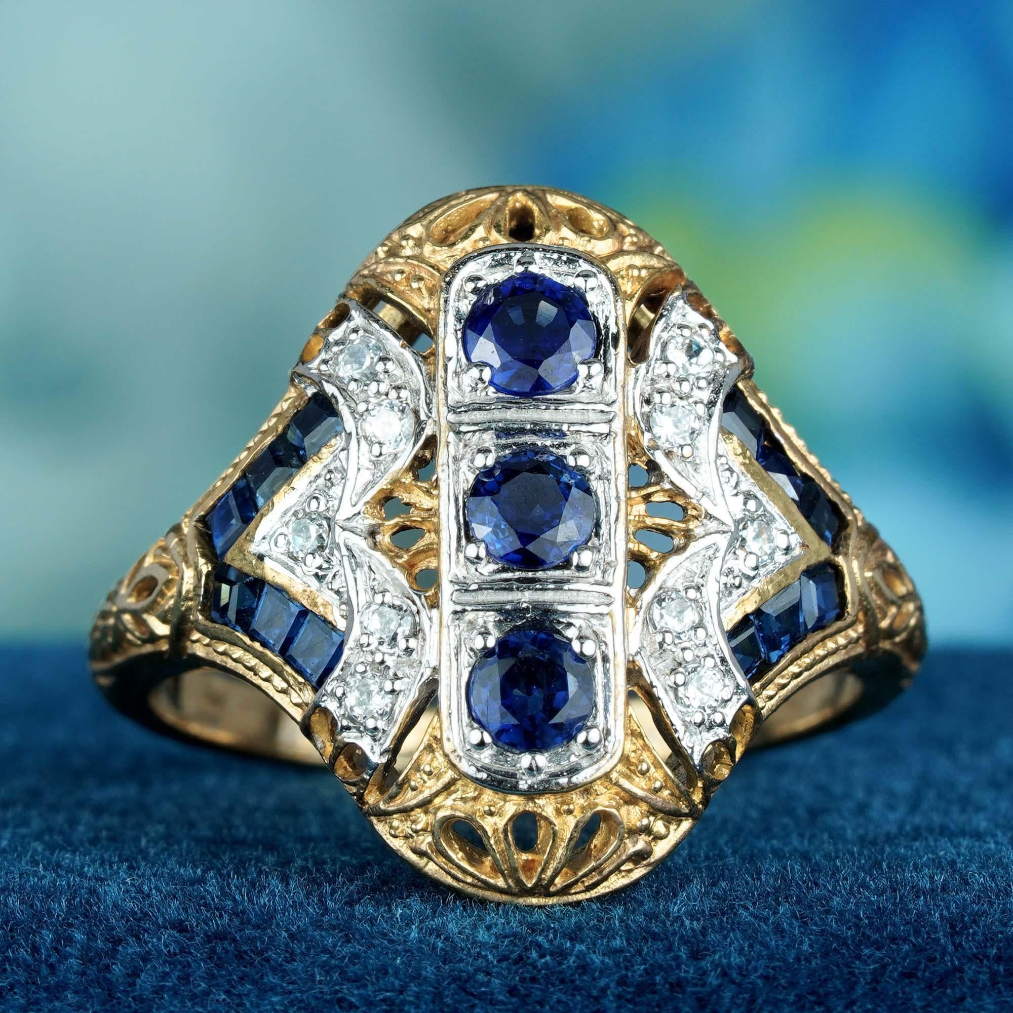 Features three natural blue sapphires arranged vertically from top to bottom at the center, each surrounded by sparkling diamonds for added brilliance. The shoulders are elegantly adorned with French-cut sapphires, enhancing the ring’s
