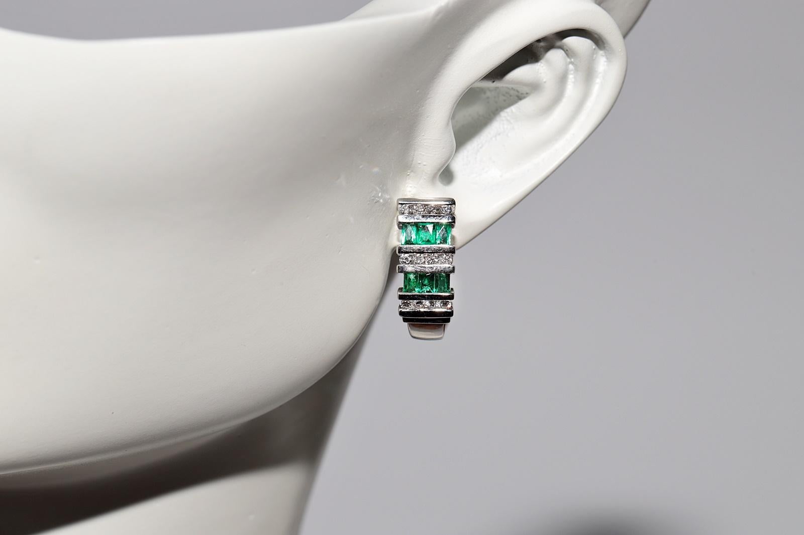 Women's 14k Gold Natural Diamond And Emerald Decorated Omega Back Earring For Sale