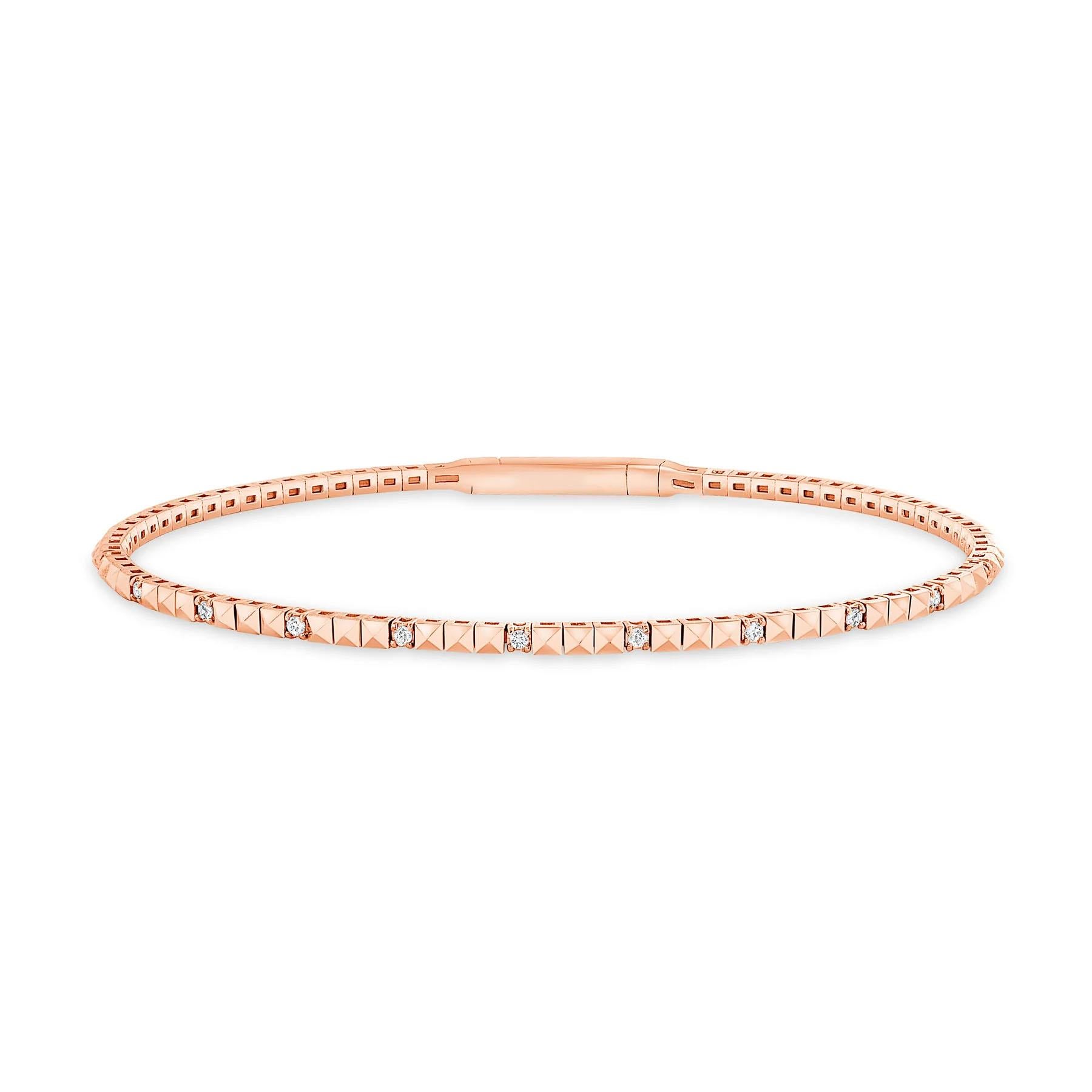 This diamond tennis bangle features beautifully cut round diamonds set gorgeously in 14k gold

Bracelet Information
Metal : 14k Gold
Diamond Cut : Round Natural Diamond
Total Diamond Carats : 0.8 ct
Diamond Clarity : VS-SI
Diamond Color : F-G
Color