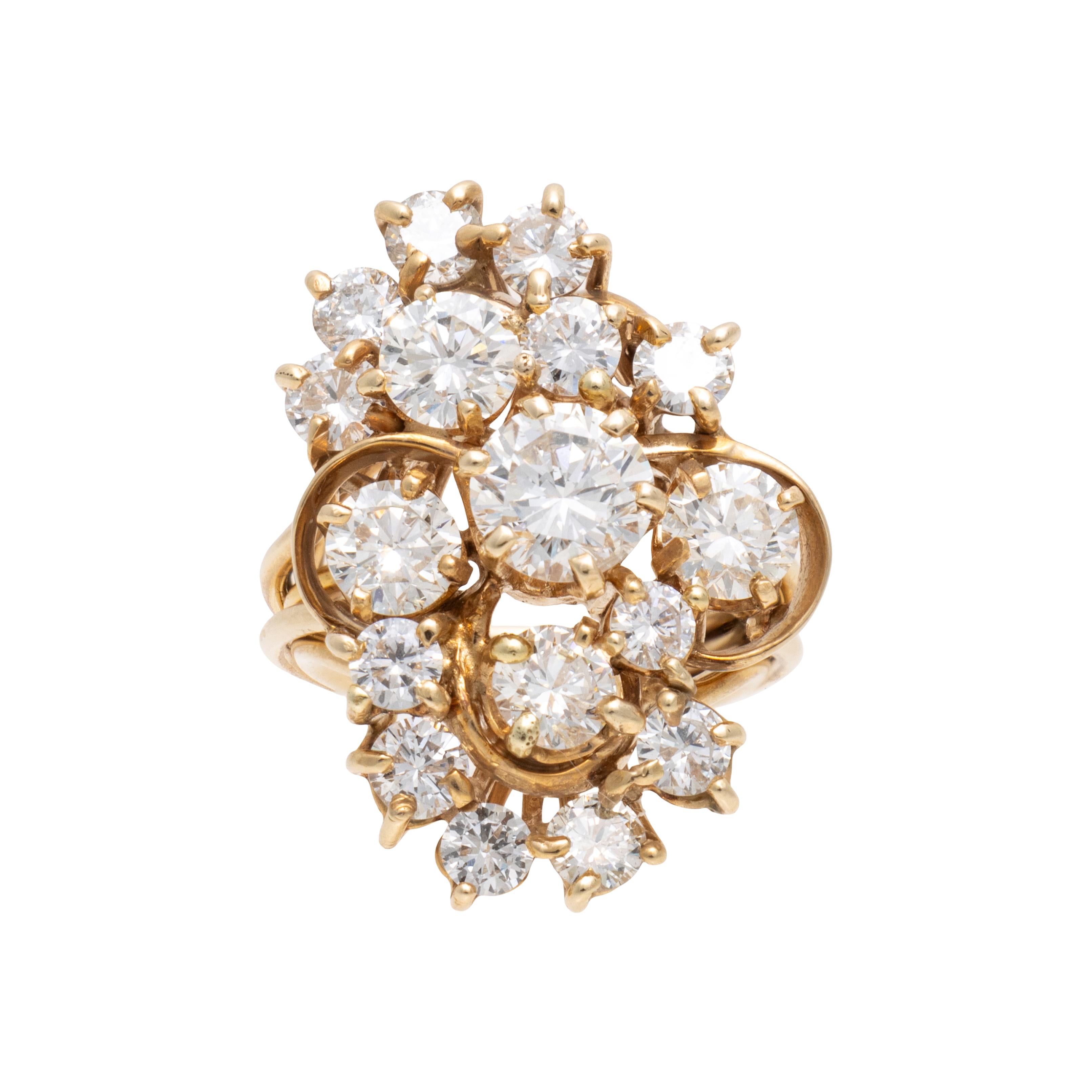 14kt yellow gold diamond cluster ring with 4 larger natural mined diamonds ranging from .42 to .50 carats (VSI to VS2), and 12 natural mined diamonds ranging from .14 to .20 carat each. Total weight 4.02 carats. Clarity of diamonds VS2 to SI1, G-J