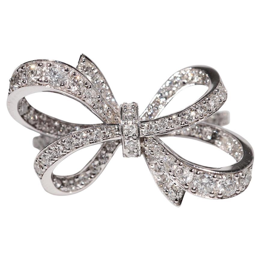 Bague en or 14k ornée d'un nœud et de diamants naturels
