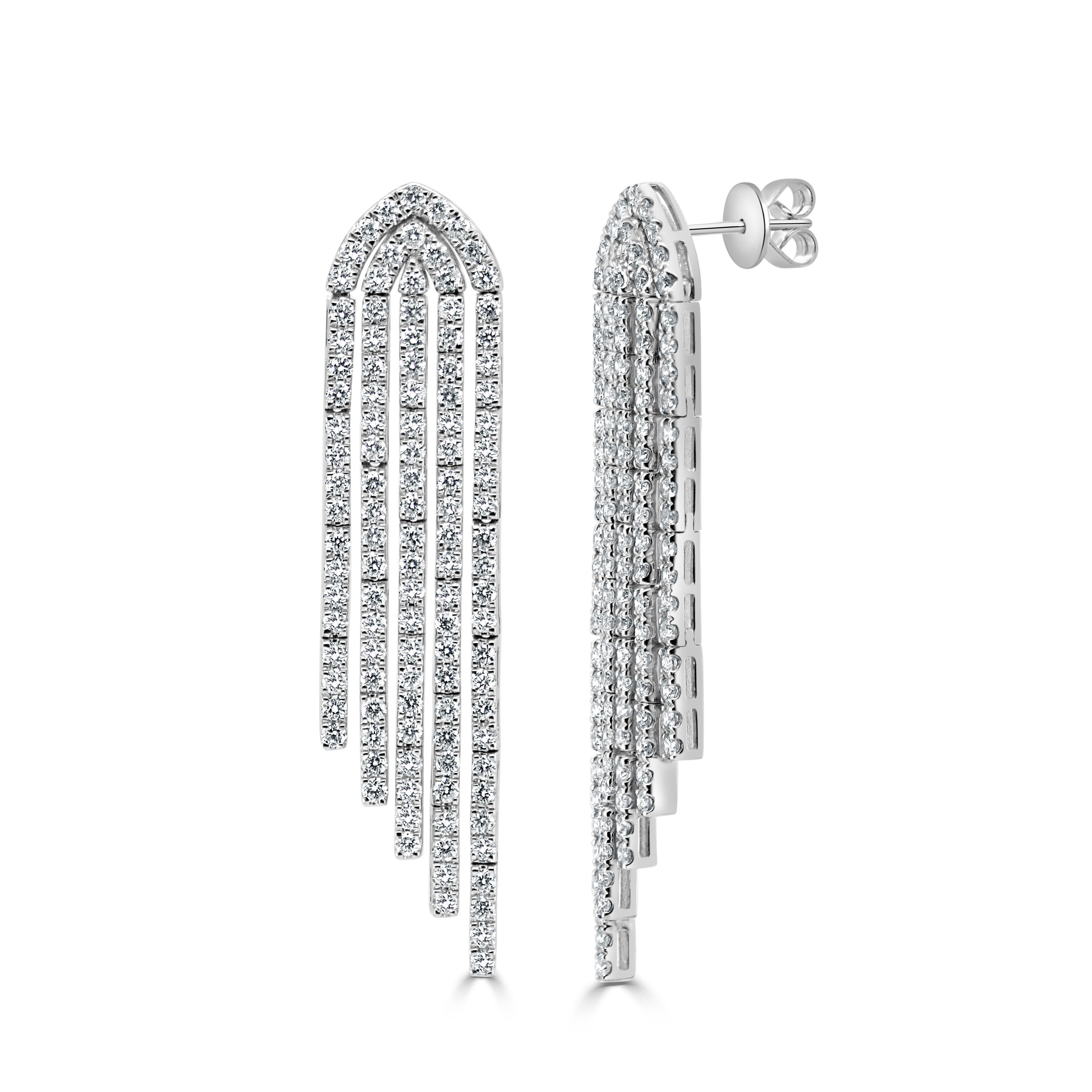 This Stunning Natural Diamond Waterfall Earrings will frame your face beautifully! Crafted of 14 gold and available in either white or yellow gold, these earrings feature approximately 230 natural round diamonds 4ct total weight. A color and clarity