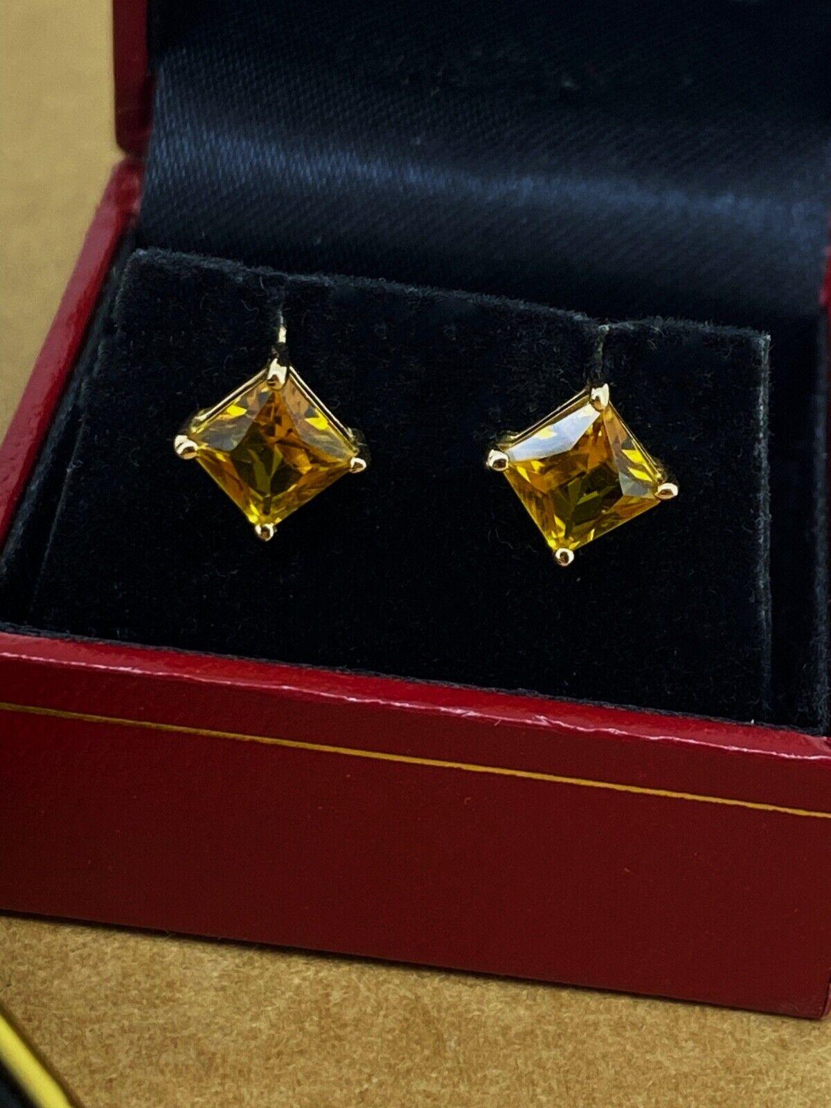 This exquisite pair of stud earrings is vintage & handmade 

Each prong-set in 14K yellow gold setting, 
completed with posts & stamped solid butterflies

Each Citrine is of square Princess Cut, 
weighing approx. 1.50ct (3.00ct in total)
of radiant