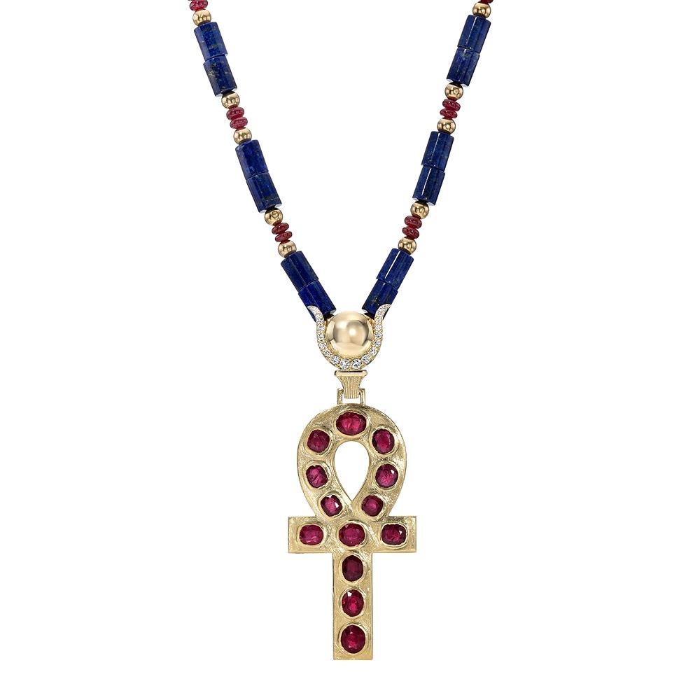 14k Gold Ankh with Rubies with Diamonds

This exquisite one-of-a kind Egyptian Revival features a Ankh crafted in 14 karat gold and bezeled Natural Rubies weighing 7.5 carats. The Ankh is a revered talismanic symbol representing the key of life. The