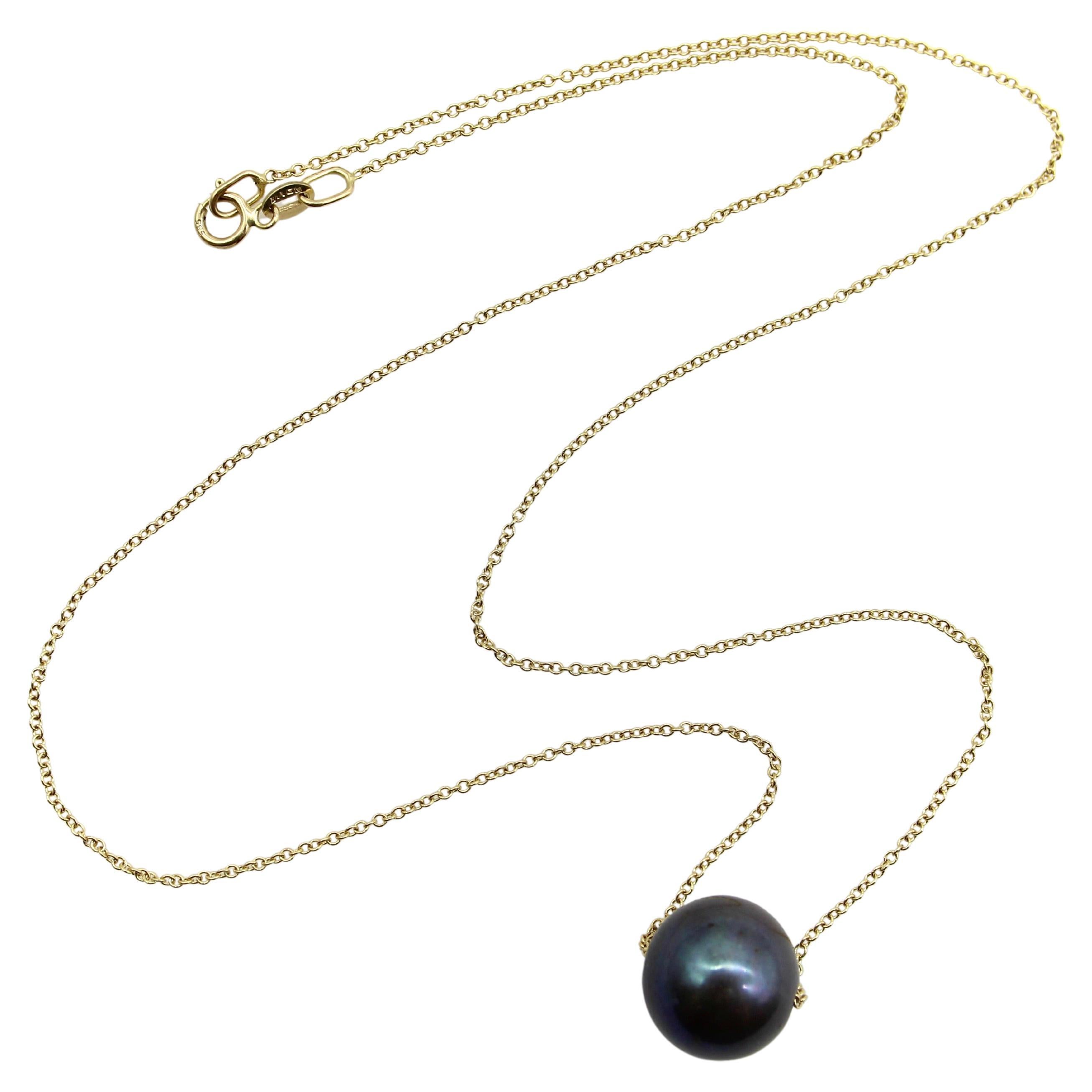 Collar de Oro de 14K con Perla Negra del Mar del Sur en venta