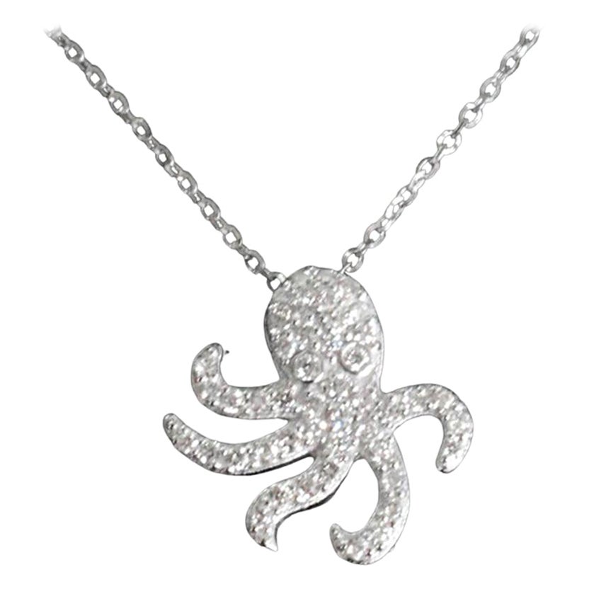 Delicata collana Charm Octopus con diamante naturale incastonato in oro massiccio 14k.
Disponibile in tre colori di oro: Oro bianco / Oro rosa / Oro giallo.

Ogni diamante è selezionato a mano da me per garantire la qualità e incastonato da un