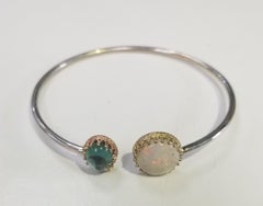 Pulsera de oro de 14 quilates con ópalo y topacio azul