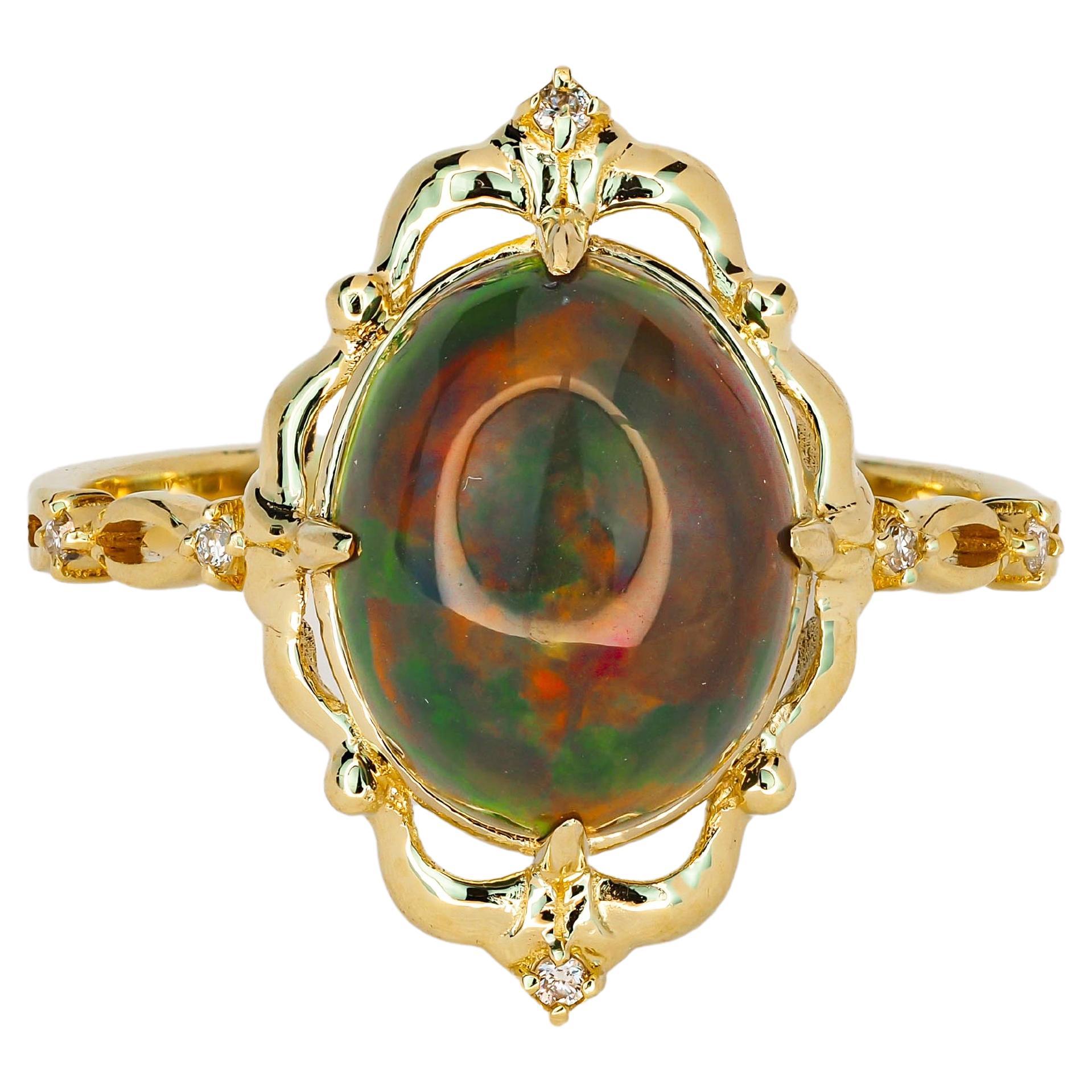 Ring aus 14k Gold mit Opal und Diamanten
