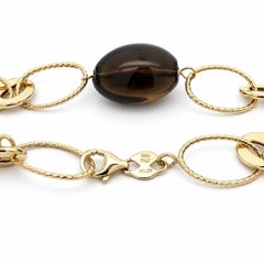 Collana da 30" in oro 14k con quarzo fumé ovale e maglie lucide a cavo intrecciato