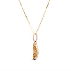 Collar con colgante de citrino naranja con pavé de oro de 14k