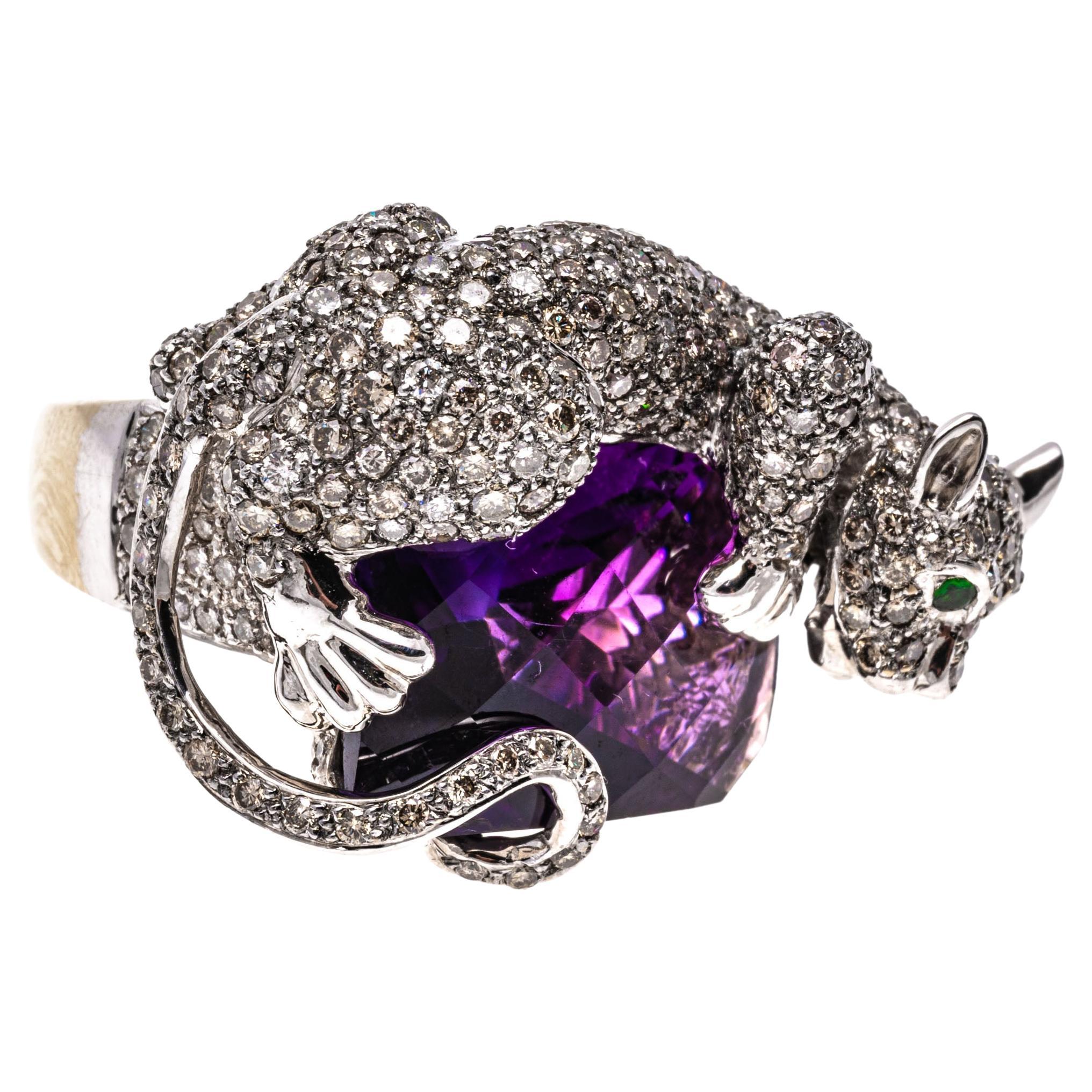 14k gold ring. This stunning ring is a white rhodium, yellow gold, figural panther, pave set with round faceted diamonds, approximately 2.82 TCW and laying atop a rectangular cushion checkerboard cut, medium to dark purple color amethyst,
