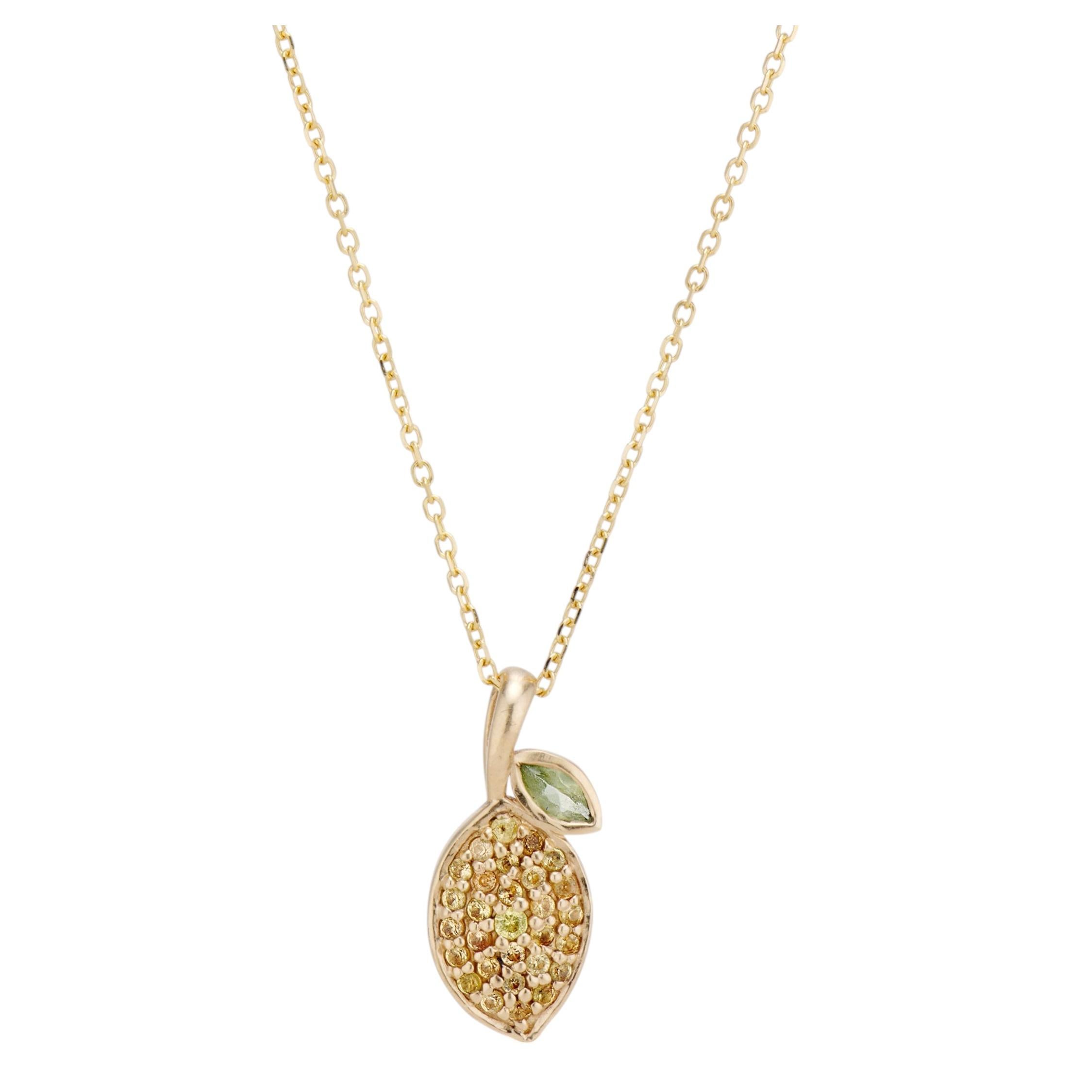 Collar de limón de oro de 14k con pavé de zafiros amarillos y peridoto
