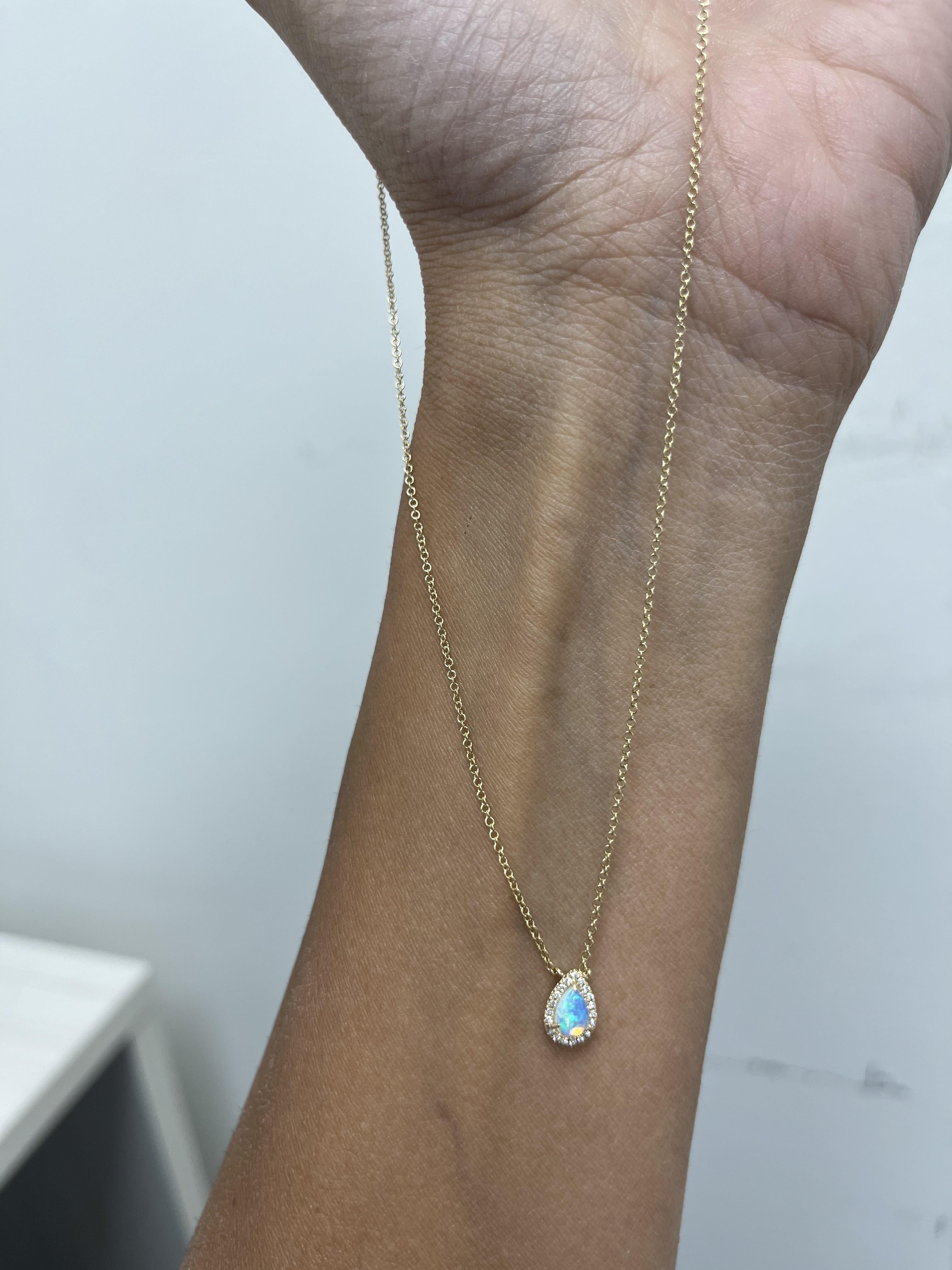 14K GOLD PEAR SHAPE OPAL & DIAMOND NECKLACE 

- Diamond Weight: 0.06 ct.
- Diamond Count: 19
- Opal Weight: 0.30 ct.
- Gold Weight: 2.03 grams (approx.)
- Necklace Length: 16-18 inches

This piece is perfect for everyday wear and makes the perfect