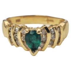 Used 14k Gold Pear Shaped Emerald and Diamond Ring