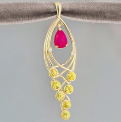 Ruby and sapphires 14 karat gold pendant