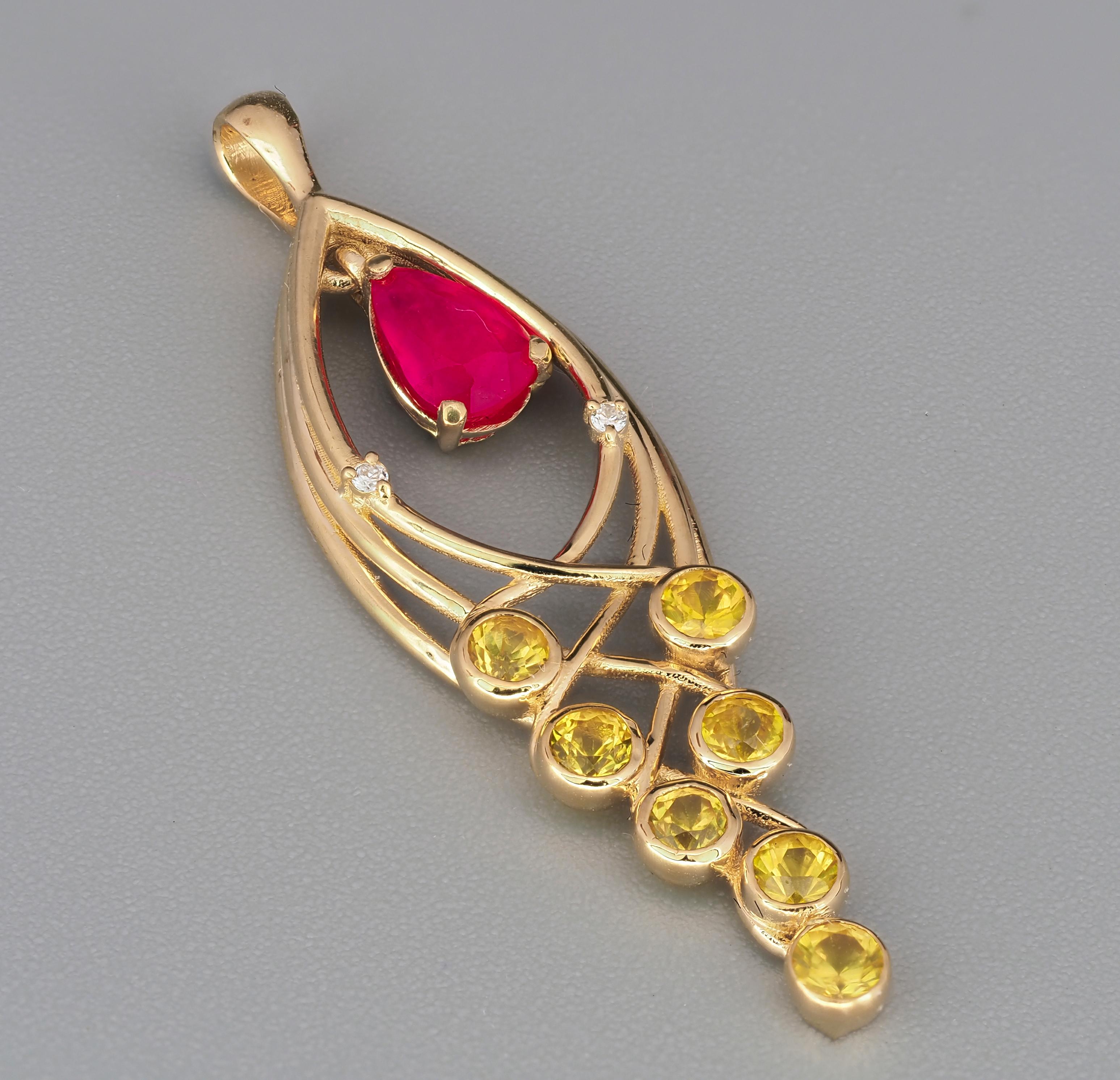 Pear Cut Ruby and sapphires 14 karat gold pendant For Sale