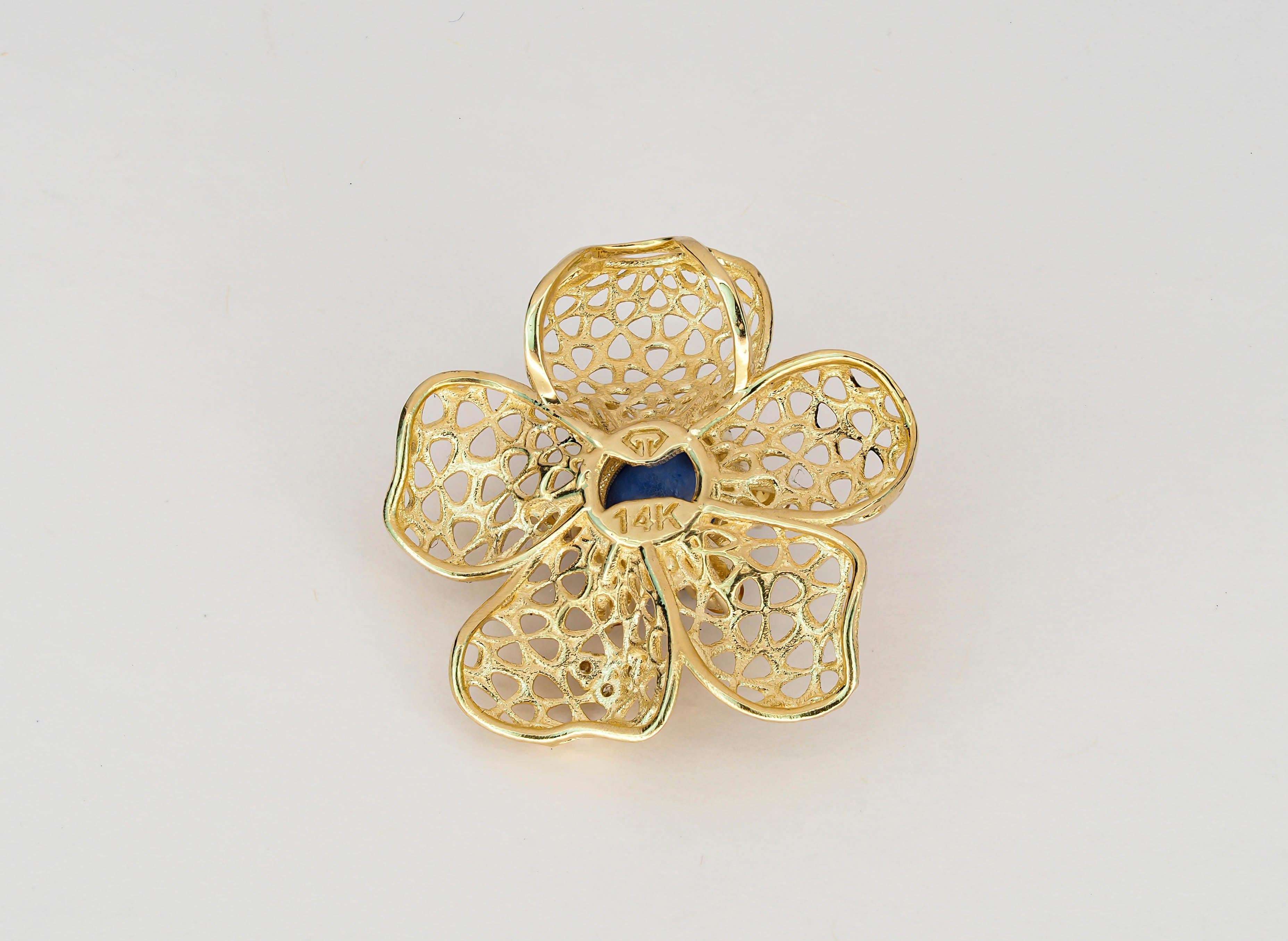 Modern 14 karat Gold Pendant with Sapphires and Diamonds. Flower Pendant For Sale