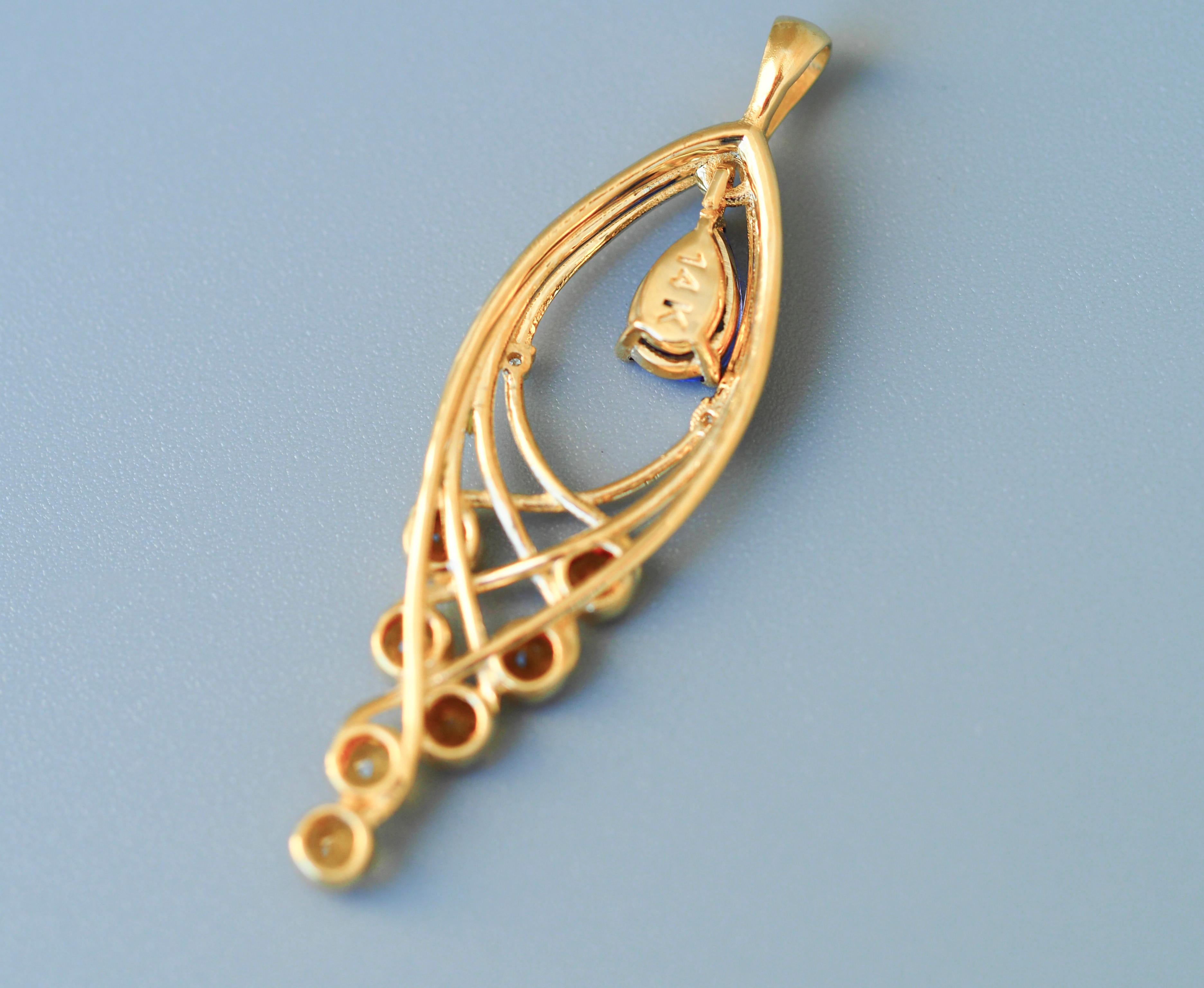 Taglio a goccia Ciondolo in oro 14k con tanzanite, zaffiri e diamanti in vendita