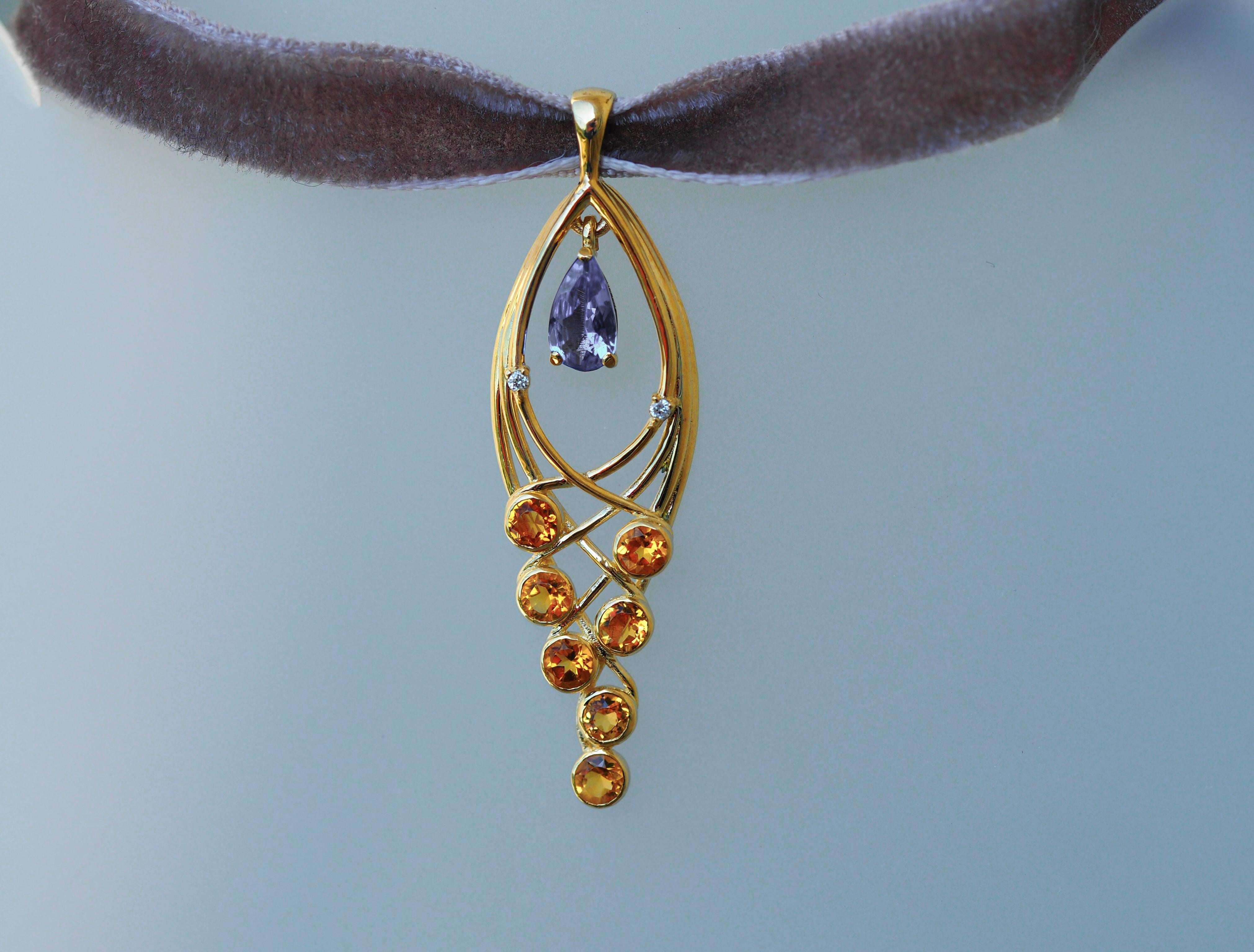 Ciondolo in oro 14k con tanzanite, zaffiri e diamanti in vendita 1