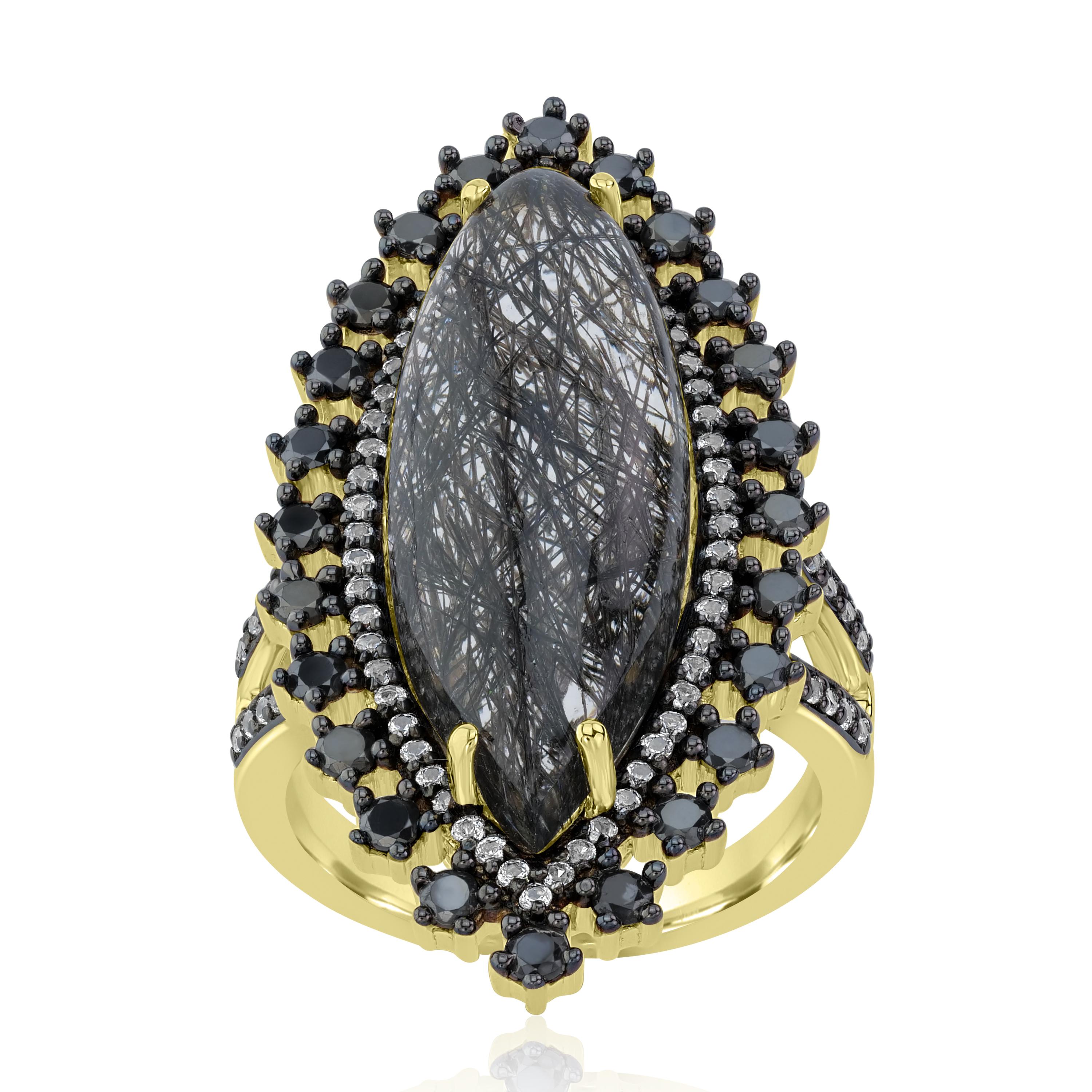 Complete your look with this bold women's ring. A 12.82Ct tw marquise shaped black rutile is framed within white topaz and black spinal in individual prongs of genuine and nickel free sterling silver. This ring comes with a 14 Karat yellow gold