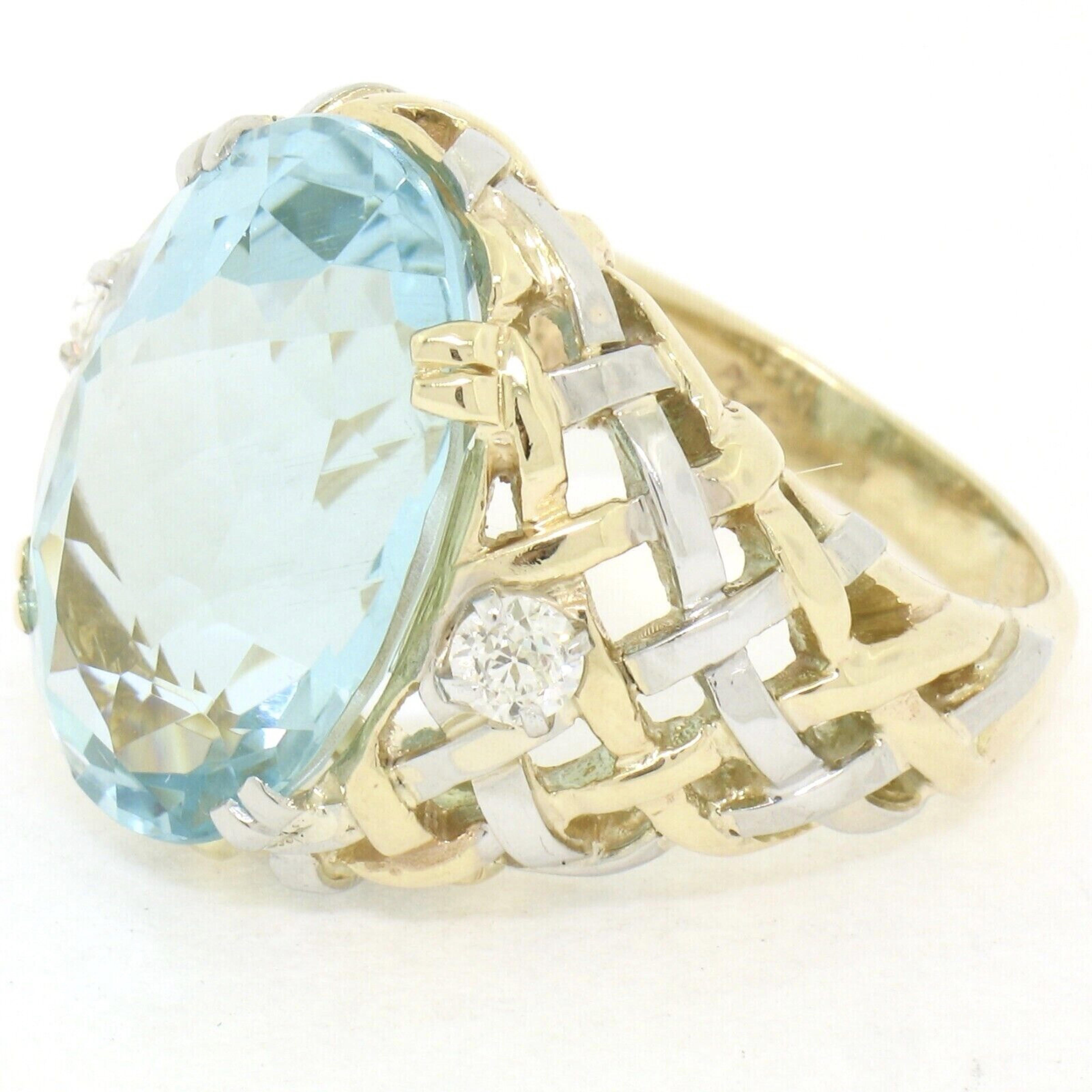 Up for sale we have an absolutely stunning, large, aquamarine and diamond cocktail ring. The aquamarine is a large oval brilliant cut stone, 19.13 carats in weight, with the most outstandingly rich and soothing greenish blue color. Accenting the