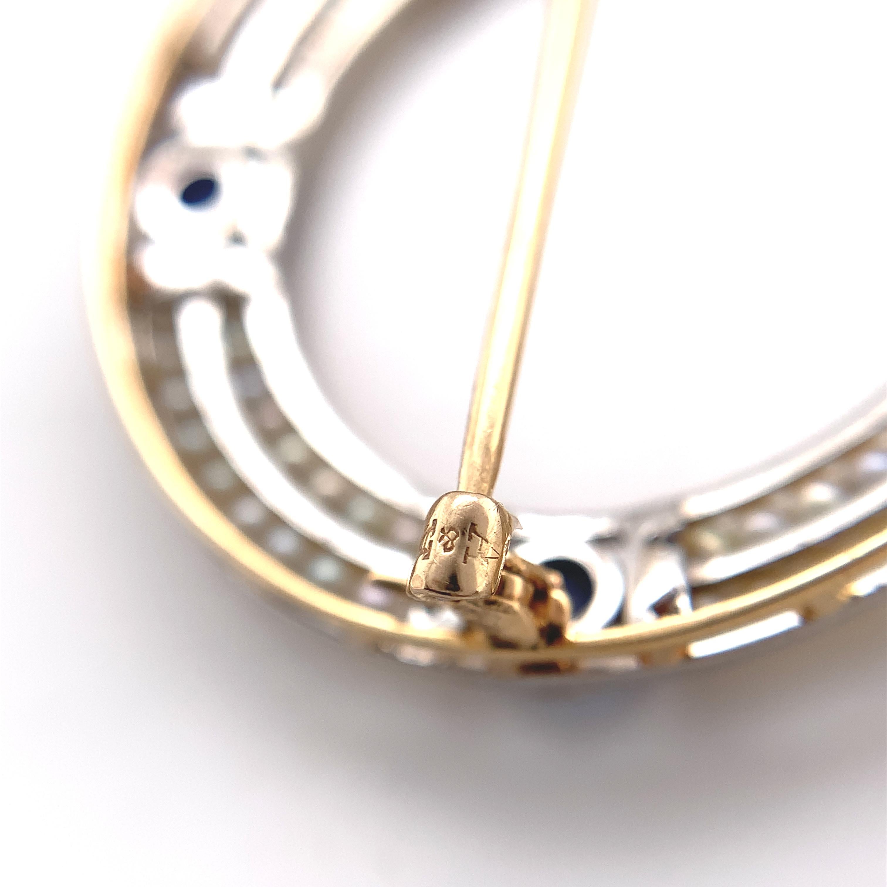 Donna Spilla in oro 14K e platino con zaffiro Montana e perle di mare con rapporto GIA