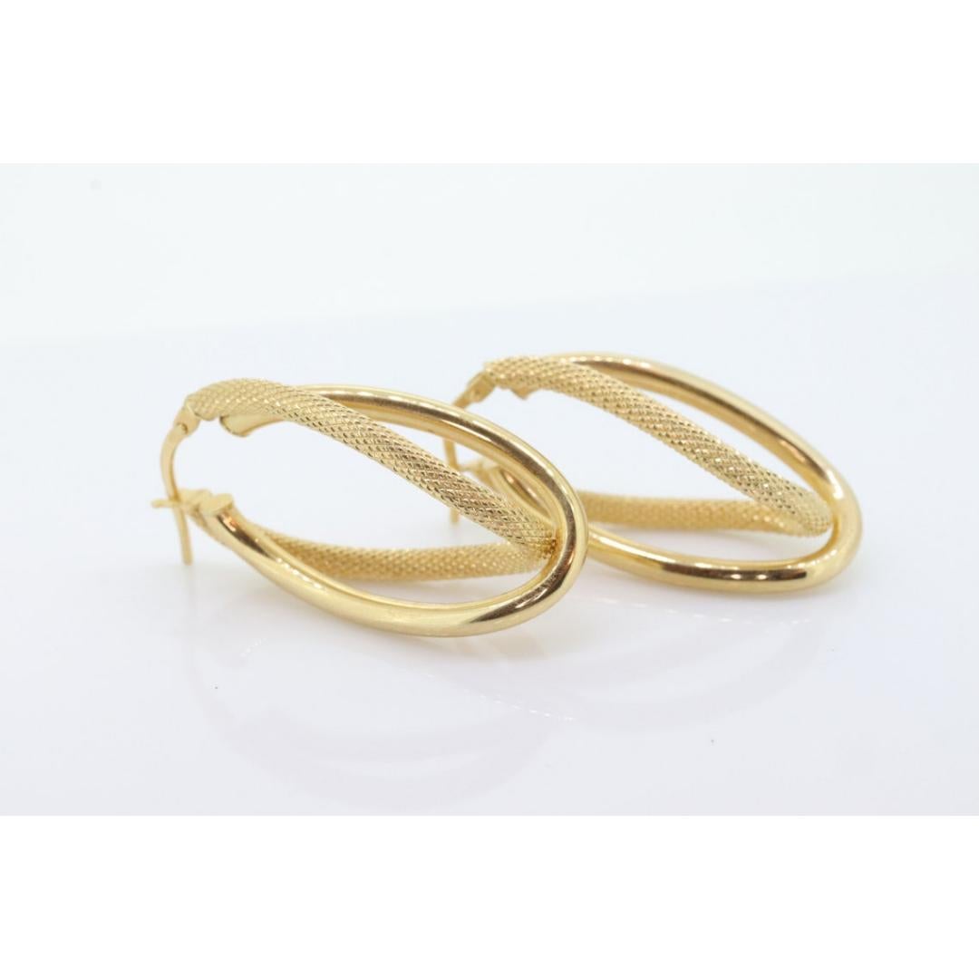 14k Gold Puffed Hollow HOOP Earrings. Intertwined Textured Loop earrings. In Good Condition For Sale In Port Charlotte, FL