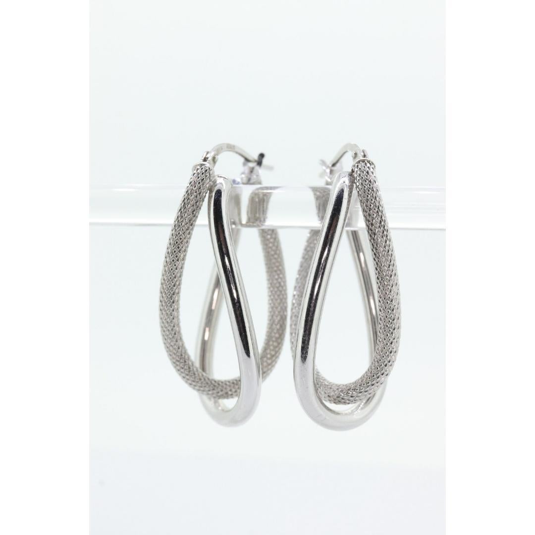 14k Gold Puffed Hohl HOOP Ohrringe. Ineinander verschlungene, strukturierte Looping-Ohrringe. im Zustand „Gut“ in Port Charlotte, FL