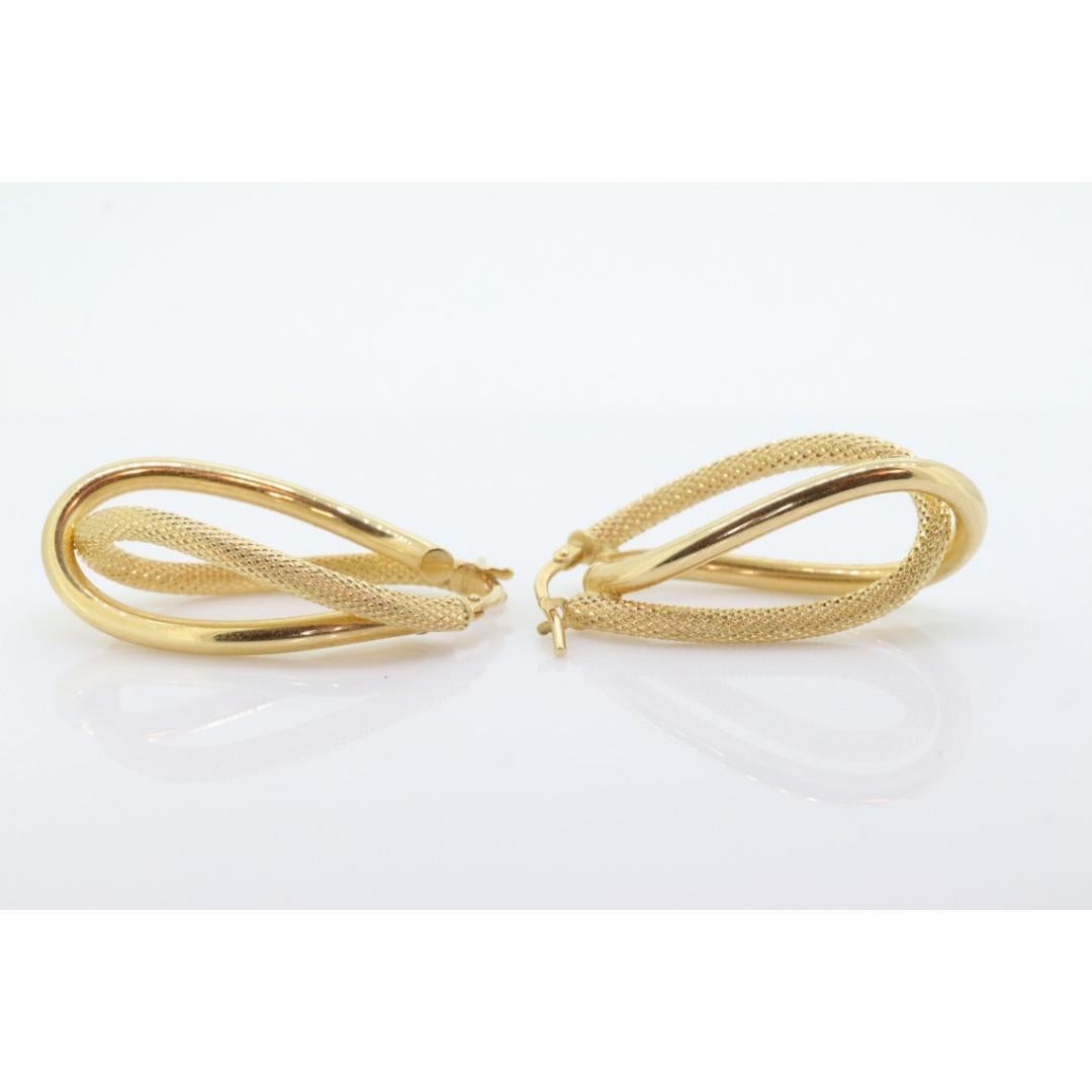 Women's 14k Gold Puffed Hollow HOOP Earrings. Intertwined Textured Loop earrings. For Sale