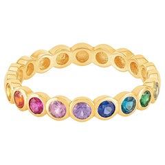 Anello mezza eternità in oro 14k e zaffiro arcobaleno Dotty