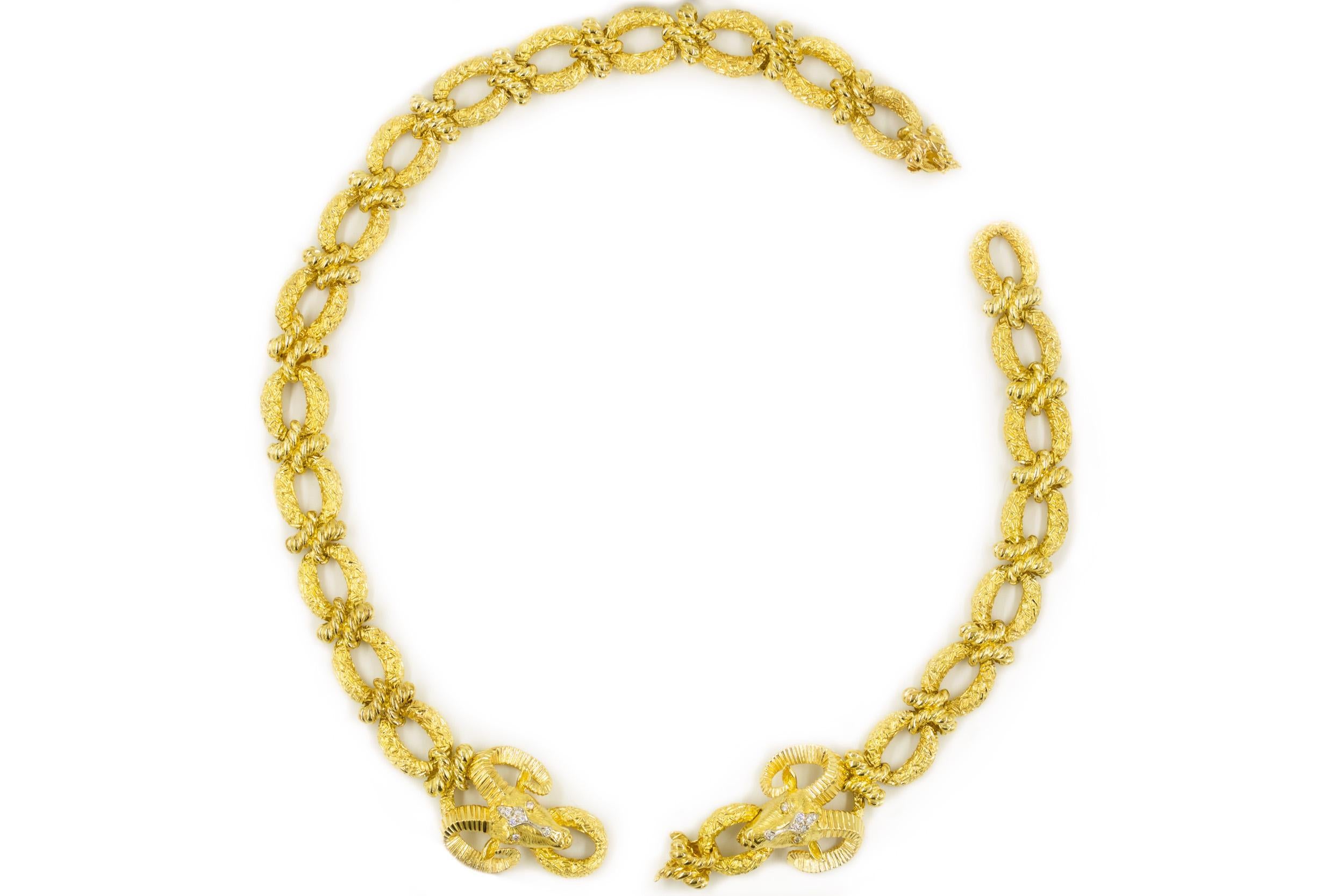 An incredibly substantial work of art crafted of 250.7 grams of 14k yellow gold and inset with 24 brilliant full cut diamonds, this intricately cast and finished work was designed by La Triomphe in the 1970s and remains in impeccable original
