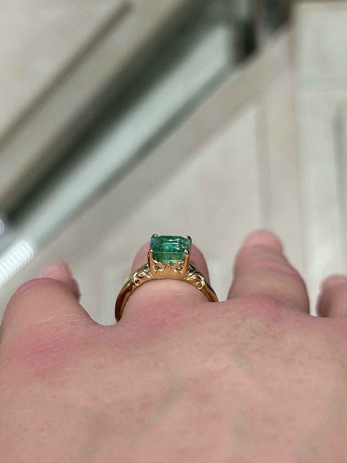 14K gold ring featuring a 2.37ct natural Asscher cut emerald in a regal floral In New Condition For Sale In Jupiter, FL
