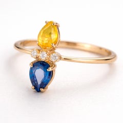 14k Gold Ring in Art Deco Style with Central Sapphires and Diamonds