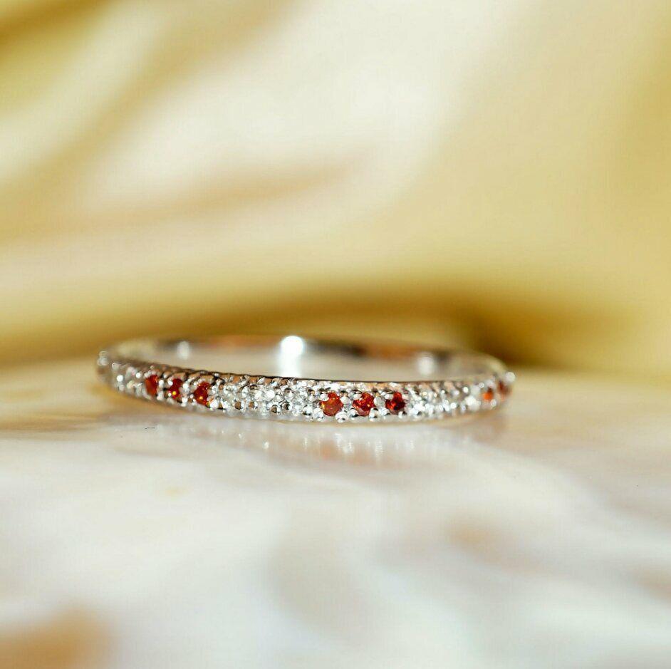 14K GOLD RING MANDARIN SPESSARTITE WEDDING BAND DIAMOND RING ENGAGEMENT BAND 
Hallmarking: 14K Hallmarked.
Total Carat Weight: 0.24 ctw & Under
Base Metal: White Gold
Secondary Stone: Diamond, Garnet, Spessartine
Band Width: 1.4 mm
Diamond Weight: