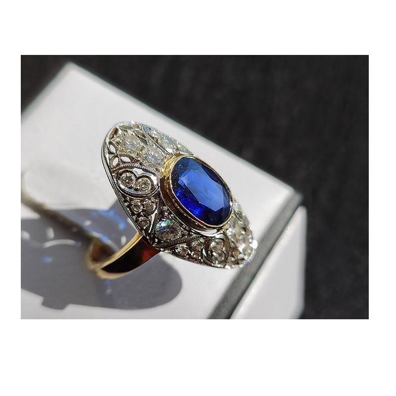 14k Gold Ring with 26 Diamonds and Sapphire

- Materials & Techniques: Gold, diamonds and sapphire
- Date the piece was created: 20th century
- Dimensions: Measure 18 (eu)
- Country of Origin: Portugal / Australia (sapphire)
- Hallmarks of all