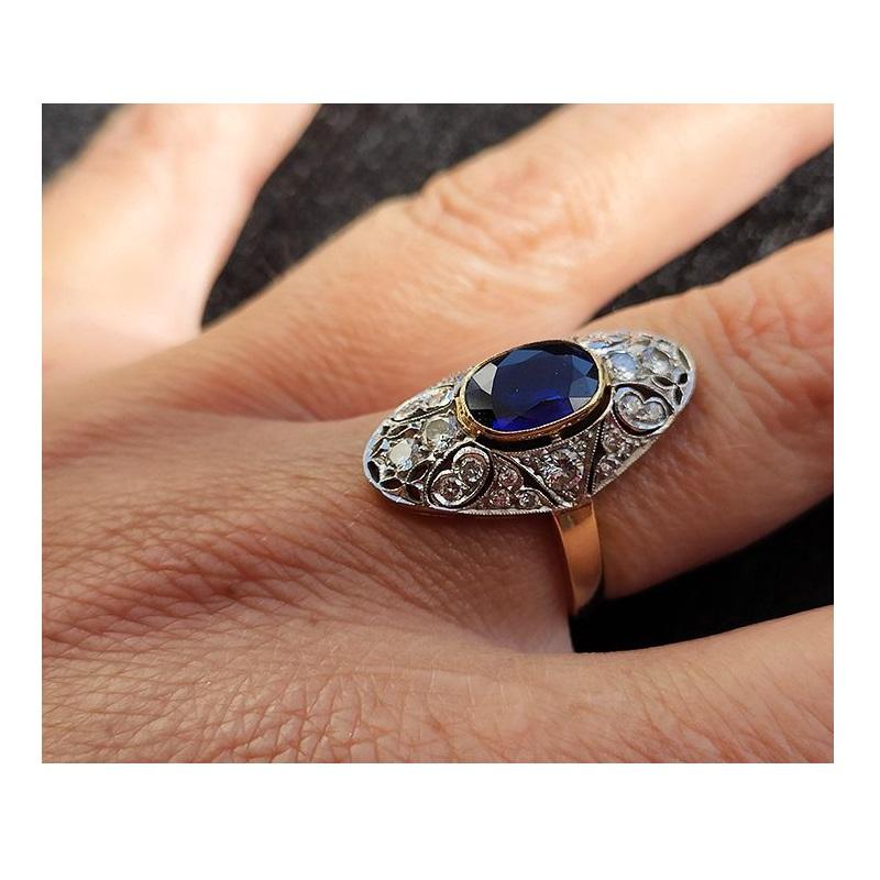 Romantic 14 Karat Gold Ring with 26 Diamonds and Sapphire