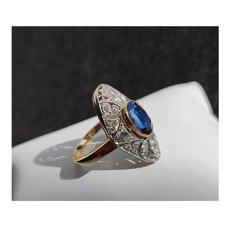 Brilliant Cut 14 Karat Gold Ring with 26 Diamonds and Sapphire