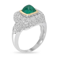 14K gold ring with a 2.54tcw natural sugarloaf cabochon cut emerald and diamond