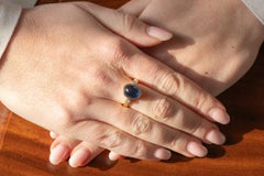 14k gold ring with a cabochon-cut sapphire 6.00ct and diamonds