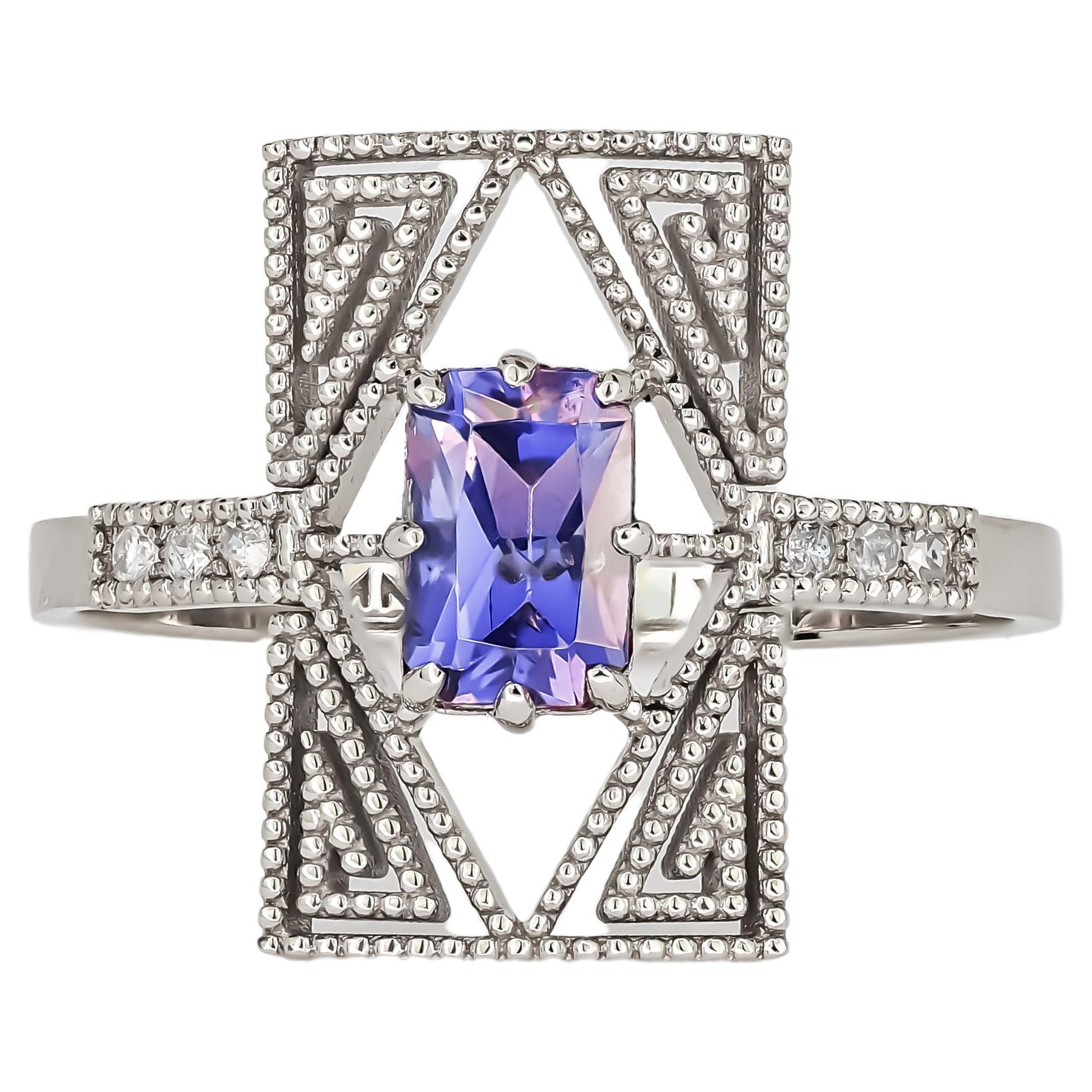 14 Karat Gold Ring mit blauem Spinell und Diamanten im Angebot