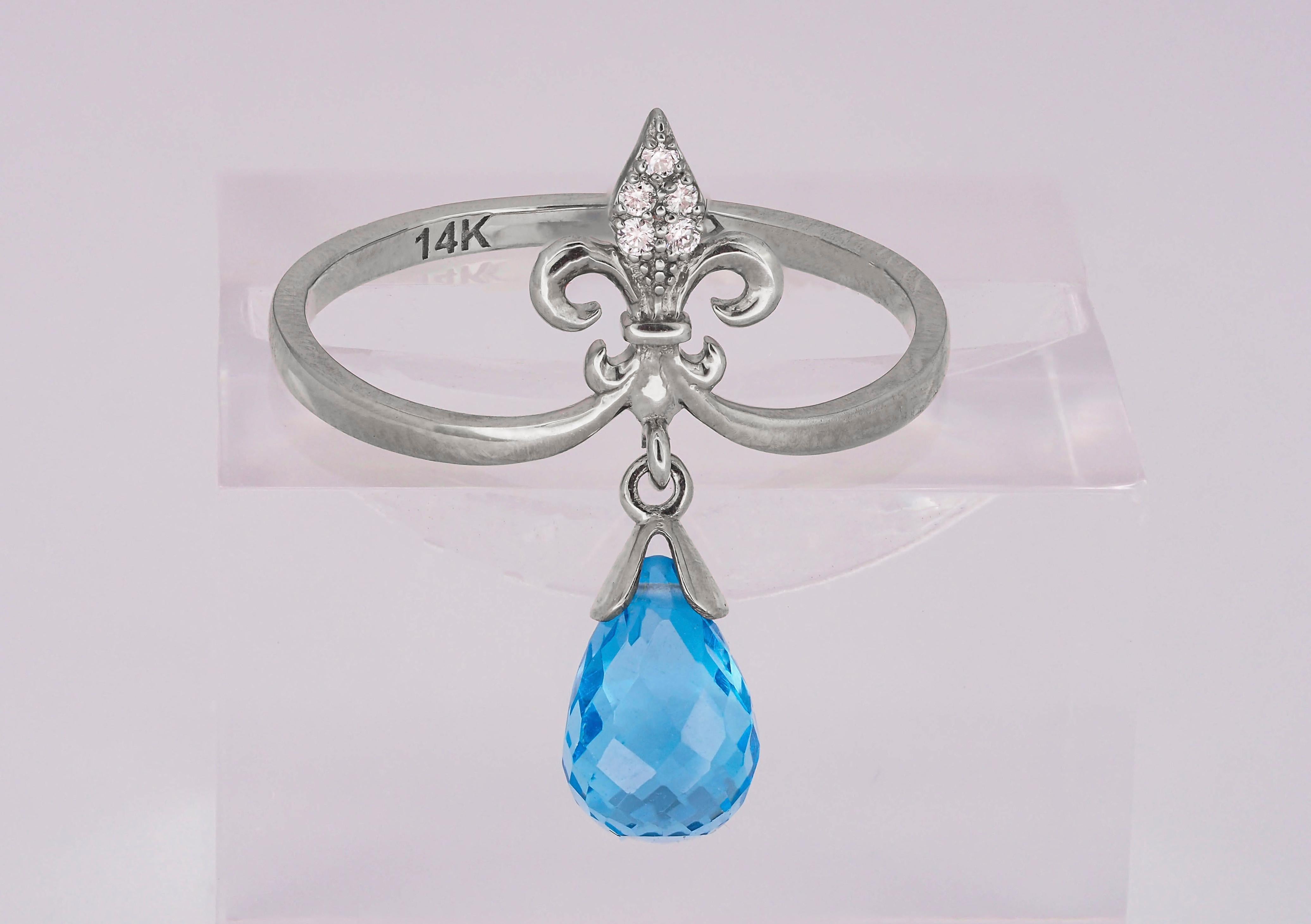 in vendita:  Anello in oro 14k con topazio taglio briolette e diamanti 12